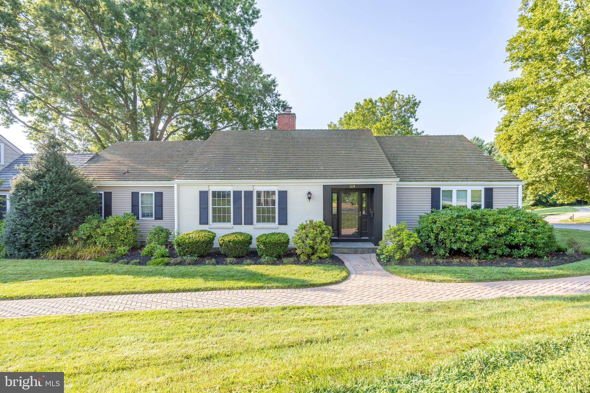 Beautifully Updated Twin with Golf Course Views in Radley Run Mews.
Welcome to 1124 Queens Way, a spacious and tastefully renovated 2–3 bedroom, 2-bath twin home in the sought-after Radley Run Mews community of Chester County. With sweeping views of Radley Run Golf Course, this home offers a comfortable yet refined lifestyle.
Step into the bright, welcoming foyer with double closets and a clear view to the rear of the home. Straight ahead, the expansive living room features picture windows, twin sliding doors to the rear decks, and a wood-burning fireplace—creating a warm, inviting space. The adjacent dining room also offers deck access, perfect for entertaining or enjoying peaceful outdoor views.
Off the foyer, the eat-in kitchen includes a built-in coffee nook, stainless steel appliances, granite countertops, St. Martin’s cabinetry, and side entry access—combining style and function. The hardwood floors throughout the main living areas were beautifully refinished in 2016.
Tucked away in the bedroom wing for added privacy, the wood-paneled study—ideal as a home office or optional third bedroom—features built-in shelving, a second wood-burning fireplace, and direct deck access.
The spacious primary suite includes a wall of closets, an updated en-suite bath with a walk-in shower and Corian countertop, plus direct access to the deck. A generous second bedroom connects to the second full bath, which includes a separate lavatory with pocket door and dual access from the hall.
The finished lower level provides a wide-open layout with multiple sliders and windows, laundry area, and direct entry to an oversized two-car garage with space for a golf cart.
Major updates include a full kitchen and bathroom renovation in 2016, hardwood floor refinishing in 2016, a new heat pump installed in 2017, and a comprehensive exterior renovation in 2022 with new siding, trim, gutters, soffits, 24 new windows, and 5 new sliders. Deck was redone in 2025 for beauty and low maintenance with Timbertech decking and vinyl rails.
Enjoy low-maintenance living with exceptional views and easy access to West Chester, Kennett Square, Longwood Gardens, and Wilmington.