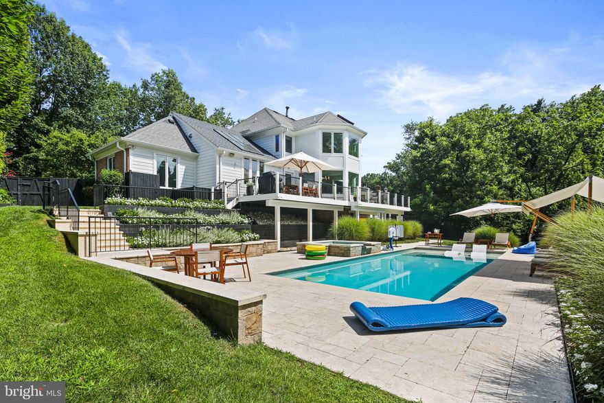 Be sure to see VIRTUAL TOUR for a 3D tour of the home!
Discover resort-style living in this exceptional five-bedroom, four-and-a-half-bathroom home nestled in the prestigious Kentsdale Estate section of Potomac. This newly listed property offers an ideal blend of comfort and sophistication, perfect for families seeking both luxury and functionality in one of Maryland's most desirable neighborhoods.
Completely re-designed and renovated in 2015, this is a custom home with high end finishes similar to a resort. The thoughtfully designed layout features five spacious bedrooms, including a stunning primary bedroom that serves as a private retreat. Each of the four full bathrooms, as well as the half-bath, showcases quality finishes. The home's redesigned configuration creates an open floor plan from the kitchen, with 2 white Carrera marble islands, to the dining area and beyond to the family room. 
Step inside to experience the resort-style atmosphere that defines this remarkable property. The interior spaces are crafted with attention to detail, offering comfortable living areas that seamlessly blend relaxation with elegance. Large windows throughout the home invite natural light, creating bright and welcoming environments in every room. The step out to an expansive deck, with enough room for a 10-seat dining table. The expansive deck overlooks the pool, spa and gardens.
The location provides exceptional access to some of the area's finest recreational opportunities. Nature enthusiasts will appreciate the proximity to Locust Grove Nature Center, offering peaceful trails and educational programs just minutes away. Families can enjoy outdoor adventures at nearby Cabin John Regional Park, featuring playgrounds, sports facilities, and scenic walking paths. For those seeking more extensive outdoor experiences, the renowned Great Falls Park provides breathtaking waterfall views and challenging hiking trails.
The Potomac location offers the perfect balance of suburban tranquility and metropolitan convenience. Residents enjoy access to highly-rated schools, upscale shopping destinations, and diverse dining options. The community's tree-lined streets and well-maintained neighborhoods create an atmosphere of refined living while maintaining easy access to major commuting routes.
This property represents an outstanding opportunity to join one of the region's most sought-after communities. The combination of resort-style amenities, thoughtful design, and prime location creates an exceptional living experience. Whether you're looking for a peaceful retreat or an active lifestyle surrounded by natural beauty and cultural attractions, this custom re-designed home delivers on every level. The five-bedroom layout provides flexibility for growing families, home offices, or guest accommodations, ensuring the space adapts to your changing needs over time.