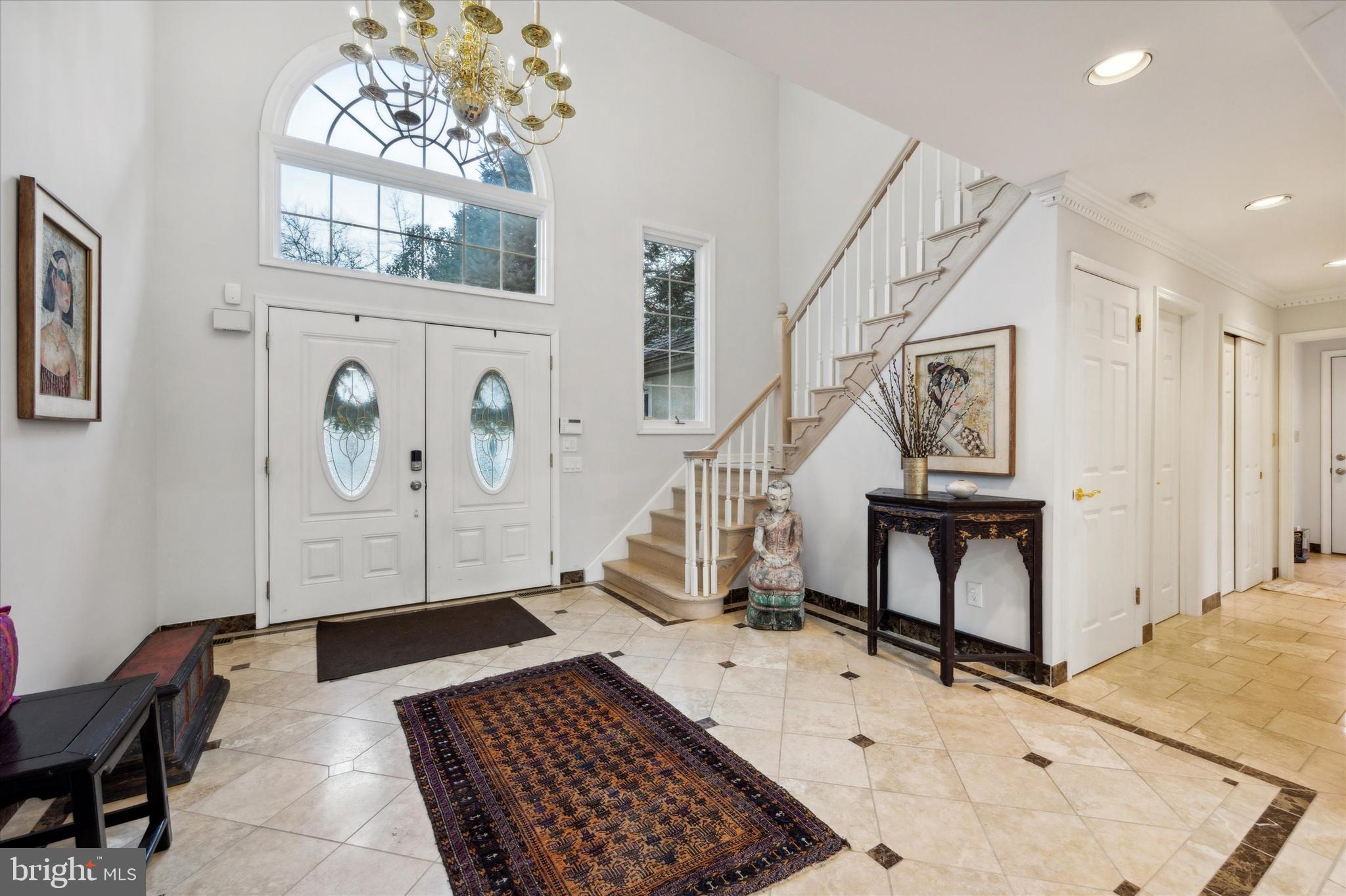 This exquisite French Colonial home boasting four bedrooms, five full baths, and two half baths is nestled at the end of a peaceful cul de sac in the sought-after Gladwyne neighborhood. Resting on a tranquil and meticulously landscaped 1+ acre lot, this residence eagerly awaits your personal touch.
Upon entering a grand two-story foyer welcomes you with custom marble flooring and soaring vaulted ceilings that seamlessly lead into the spacious living room. Floor-to-ceiling glass French doors and windows open to the expansive flagstone patio, creating an ideal setting for outdoor gatherings. Adjoining the living room is an expansive entertaining/screening room. The chef’s gourmet eat-in kitchen showcases designer cabinets, countertops, and top-of-the-line stainless steel appliances, including a 6-burner cooktop, double
ovens, an oversized 46" wide side-by-side refrigerator/freezer, two dishwashers, a wine refrigerator, and an ice maker. The adjoining breakfast nook features a vaulted ceiling and skylights, and is open to the patio. Beyond the kitchen is the laundry room, and access to the two-car attached garage.
The primary bedroom is a luxurious retreat, featuring a private sitting room with a gas fireplace and a spa-inspired ensuite with marble flooring, solid wood cabinets, soaking tub, and heated floors. A custom walk-in closet and a private gym/office complete this suite.
The second level hosts three spacious ensuite bedrooms each with built-in closets. Also, bonus room perfect for extra storage and full hall bathroom.
The finished lower level presents an oversized bar with granite counters, solid wood built-in shelving, a powder room, and an abundance of storage space.
Located in the heart of Gladwyne, this serene retreat is just minutes from major highways, shopping, and parks, offering the perfect blend of tranquility and convenience. This home also includes a whole house generator.
Home has been re-assesed for a tax reduction. Final amount to be determined.