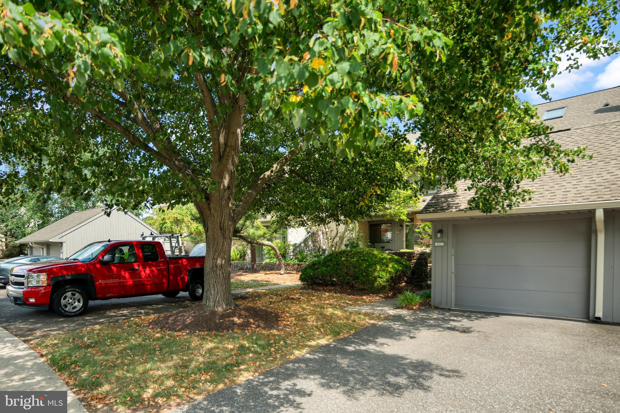 Welcome to 200 Clover Hill Ct! This 3-bedroom, 2.5-bath Yardley home has been tastefully updated and meticulously maintained—perfect for today’s buyer looking for comfort and convenience. Recent upgrades include a new roof (2023), updated bathrooms (2025) , new water heater (2024), revitalized patio deck (2020), cleaned chimney, replaced skylights, and upgraded gutters. Inside, you’ll find an open flowing layout with a renovated half bath on the main level, spacious living area, a family room, kitchen and dining area leading outside to your own private deck, ideal for guests and everyday living. Upstairs you'll find three generously sized bedrooms and two fully updated bathrooms with a walk in closet in the main bedroom. Additional highlights include a detached garage for convenient parking and storage, and a quiet, well-maintained community setting close to shopping, dining, and commuter routes