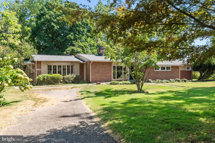 Lifestyle, location and space to reenergize. Location is key with this home. Rare opportunity to live and experience the tranquility and beauty of  the Ferry Farms community. Short walk to a small beach and water access. Quaint neighborhood with views of the Naval Academy and Severn River with some of the most sought after waterfront homes on the Severn.  This renovated vintage home has a mid century modern feel when you enter. The kitchen is truly a chef's play room. Large second prep sink and quality stainless steel appliances, all new. LVP wood flooring installed throughout the home. Three generously sized bedrooms two of them have vintage en-suite full baths. One level living for everyone to gather in rear living space. Generously sized fenced in rear yard with nature all around. Flat stone patio with awning to sit and catch some air! Catharine Green Park is very near by with cartop boat launching, fishing and enjoying the waterfront views with a sandy beach. Ferry Farms is convenient to all of Annapolis, unique shops, art galleries, Navy Stadium and some of the best dining options out there. Enjoy an early walk, jog or a bike ride into town. Naval academy just over the river!!