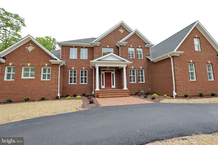 *** The price of the home does not include the lot price.
     
CUSTOM STOTTLEMYER HOME!  All brick home build specifically for the owner. Numerous custom  upgrades throughout! Open floor plan with large kitchen and separate eating area. Custom trim in most of the rooms with high end hardwood throughout the the home and ceramic tile in all bathrooms. Large first floor primary bedroom with custom bathroom - bedroom leads out to large deck with hot tub. One bedroom on 2nd floor has a refrigerator and sink. Fully finished basement with bedroom, 2 bathrooms and full kitchen.