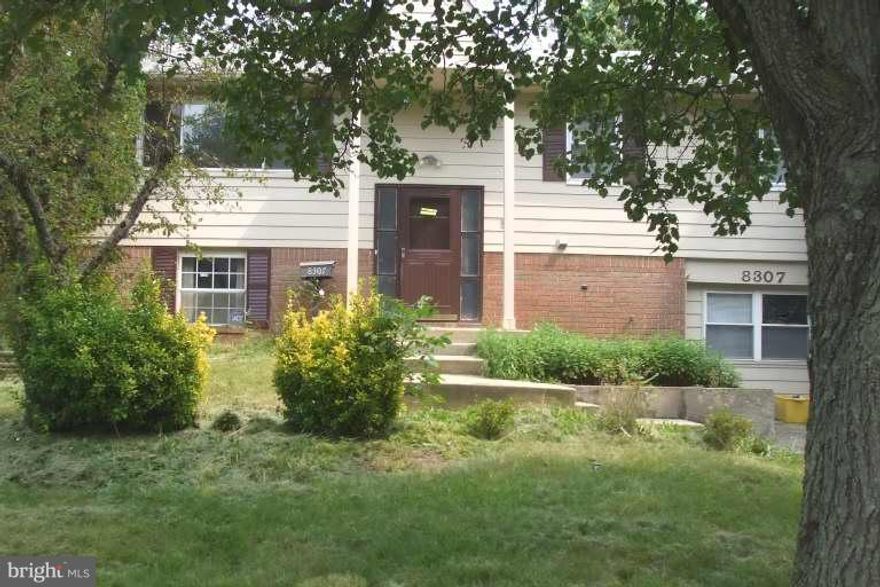 SHORT SALE. PRICE SUBJECT TO 3RD PARTY APPROVAL. SOLD STRICTLY "AS IS". Large home with 5 BR 3.5 BA. Second large kitchen on lower lever. Fire PL on lower level. Offers from investors will be considered only after property has been on the market more than fifteen days. 24 hr notice required.