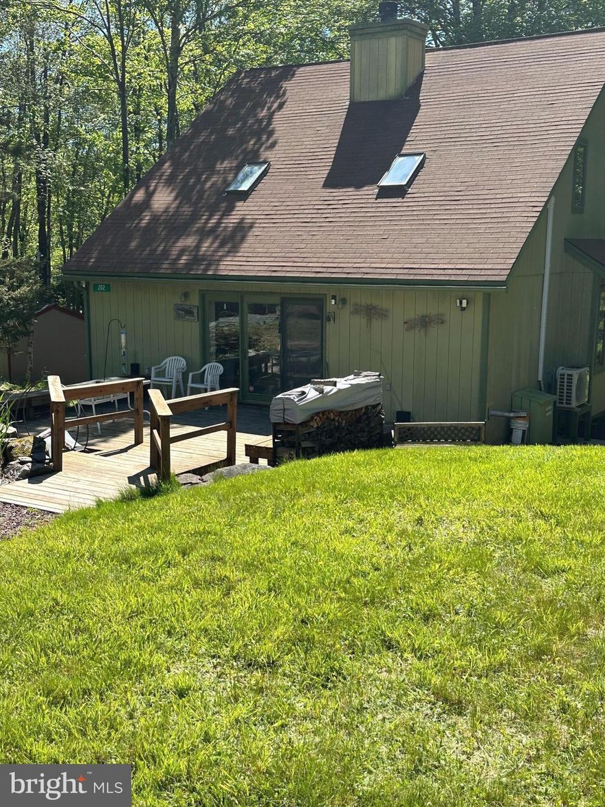 ADJACENT LOT INCLUDED WITH ACCEPTABLE OFFER.  Lot is flat and buildable with approximately an additional .35 acre.  Welcome home!  This well maintained 3-bedroom, 2 full bath home is waiting for you.  Home boasts both front and back decks, front deck with plenty of built in seating on both sides and back deck large enough for you outdoor gilling.  A screened in patio with ceiling fan and sky lights in the back for additional outside entertaining space.  This home backs up to 35,000 acres of state game lands for added privacy and plenty of wildlife to enjoy.   Enter the home from the front deck with glass door and  full size glass front panels  to enjoy nature at its best.  The living room has vaulted ceilings with wood burning stone fireplace as well as a pellet stove for those cold winter nights.  The open concept flows into the dining area and well-appointed kitchen.  The kitchen has an island with stainless steel dishwasher.  There is also a walk-in pantry and washer and dryer on the first floor.    Access to the screened in patio from the kitchen.  This floor also has a bedroom and full bathroom.  All rooms have ceiling fans.  A mini split for air conditioning and an additional heat source if needed.  Upstairs are two bedrooms with an adjoining full bathroom.  The upstairs master bedroom has sliding doors to a balcony to enjoy your morning coffee.
Arrowhead lakes offer 2 lakes, 3 pools, 4 beaches, multiple playgrounds, tennis courts, pavilion, sledding hill, Club house with library, work out room, Billard's room for adults.  There is also a kids playroom located on the bottom floor of the main offices.  The activities are great and year-round.  Many bonfires, food truck events, Bingo, karaoke, crafts, live music, kids programs,  too many things to list.