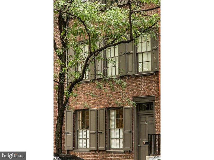 For the first time in almost half a century, this distinguished Federal Townhouse, circa 1824, is available on the Open Market. Facing handsome St. Peter's Church and Churchyard, it's like living on a London Square.  With sunlight pouring in, and consistent views of trees and greenery being inside one feels "above the fray" of ordinary urban life with high ceilings and original random hardwood pine floors. On the Ground Floor there is s guest apartment consisting of a long Living Room/Dining Room; an eat-in Kitchen with washer-dryer; a Bedroom and Bath; and a cozy Library/TV Room which opens onto a lovely walled garden, which is an oasis of quiet and calm. And in the  evening, with it's beautiful lighting, and the flickering fire-flies, it is also enchanting. This apartment has been rented for $2200 per month. or a delightful in-law suite. The main part of the house is reached through a thirty foot long Gallery, and up a flight of stairs, which gleam and glow - the product of years of  careful attention. At the front there is a large Living Room/Reception Room facing South and the Churchyard. Adjacent is a light-filled Library and powder room. In the center  of the house is a dining room which easily seats eight to ten persons for dinner, but which has also hosted buffet dinners for up to forty-six. The kitchen has lovely views from both the side and rear windows, and  abundant storage and counter space. Upstairs to the 3rd floor front room - now used as an office facing the Churchyard. It would make a gracious Master Bedroom. Another bedroom - used as the Master, is quietly off the street and has a lovely view of the side garden with it's plantings and obelisk. The spacious Master Bath has a separate shower and bathtub with an adjacent laundry room and excellent storage. There are plentiful closets throughout the house. On the fourth floor there are two additional bedrooms and a massive cedar-closet. 2 zone heat and air conditioning and full, unfinished basement. The current owner, is a nationally published Designer, who has also worked in London, Paris, and the Loire. The house reflects his long-term attention to detail, and his classic originality. It has long been an expansive and welcoming house and this is truly a rare  opportunity to purchase one of Society Hill's most handsome properties, located  on the neighborhood's MOST ATTRACTIVE block.