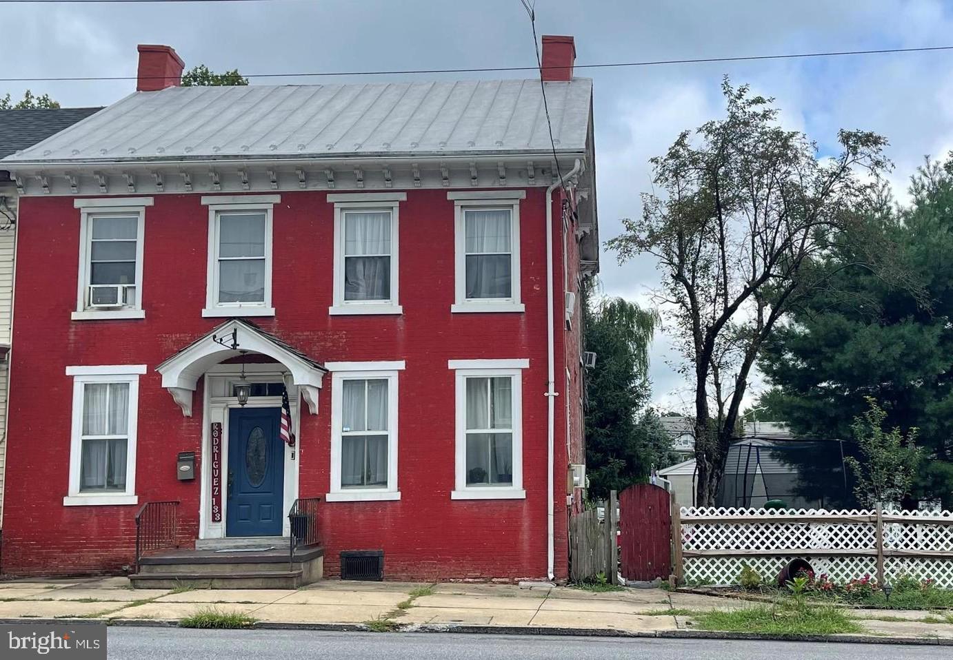 Restored HISTORIC brick home in downtown Annville's historic district. Features include hardwood floors in LR/DR, modern kitchen, 3 hall-entry bedrooms, 2 full baths, porch on 2nd floor, 1 car detached garage with off-street parking in the rear. Large backyard with fence. Low energy costs. Annville has small village appeal with trendy restaurants and coffee shops, antique and thrift stores within walking distance.