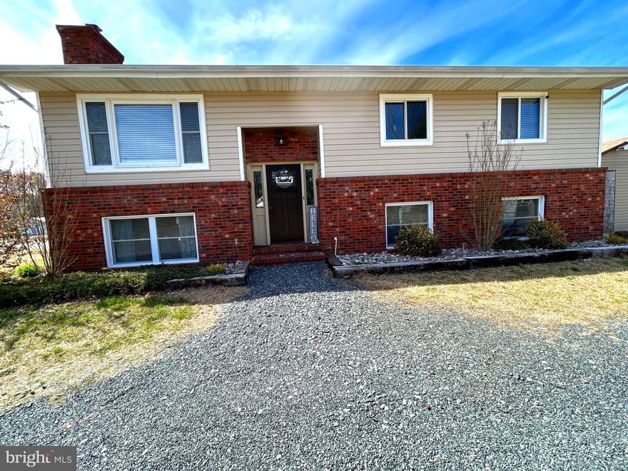 Welcome to this  2,044 sq ft.,  Home!! With 4-5 bedrooms and 2 baths, this home has a large primary suite with a sitting area,  which opens  to a large trek deck off of the rear of the home.  The space in the large walk in closet/ bonus room will amaze you.  A spacious  recreation   room downstairs  with french doors that  access  a large fully fenced in back yard where you can enjoy entertaining or  just relaxing. New septic, new 4 inch well,  new hot water heater, new water pump and conditioner were all added in 2020. This home could be just what you are looking for, don’t let it get away!