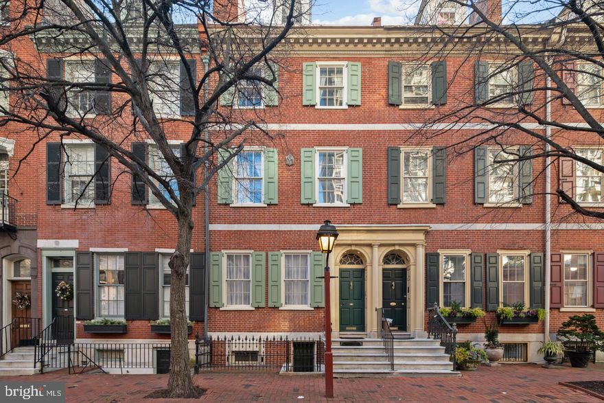 Large, light-filled space, location and parking! The traditional facade opens to a superb combination of historic and contemporary features including marble mantels, huge windows, moldings,  open flexible rooms great for both  grand entertaining and comfortable living.  Enter through the marble foyer to a large living room  with high ceilings , a marble fireplace and huge windows emitting wonderful natural light. The  living room overlooks a spacious atrium kitchen. Rear of the first level is a light  flooded gallery to showcase collectables or a flex space for a music room, office, etc. Its large windows  view the lovely garden and parking.  Along with the kitchen, the lower level boasts a fabulous den with a fireplace, dining room, powder room, wine closet and laundry. The MBR  suite on the 2nd floor includes a  fireplace, full bath, sitting room and  lots of closets. The 3rd floor offers two additional bedrooms, one has a fireplace  and there is a full bath in the hallway plus a fantastic deck. The 4th floor is open space for a  4th bedroom, studio, playroom, exercise room, etc. This awesome Society Hill home with its sensational location  and  extraordinary space provides a wonderful lifestyle within easy access to the amenities of city living -including parking!