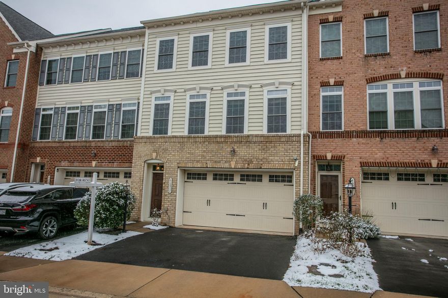 Beautifully updated 3-level townhouse in the sought-after Avonlea / South Riding community available immediately. This home features brand new LVP flooring on the main level, basement, and upper hallway, new hardwood stairs, and fresh interior paint throughout. The kitchen includes the stainless steel appliances and is being refreshed with a brand new tile backsplash.

The finished basement offers a spacious rec room or office area. Exterior is being power-washed for a clean, like-new appearance. Enjoy a private deck/patio, garage parking, and easy access to Route 50, Route 28, shopping, dining, and Dulles Airport. A beautifully upgraded home in a fantastic location—move-in ready!