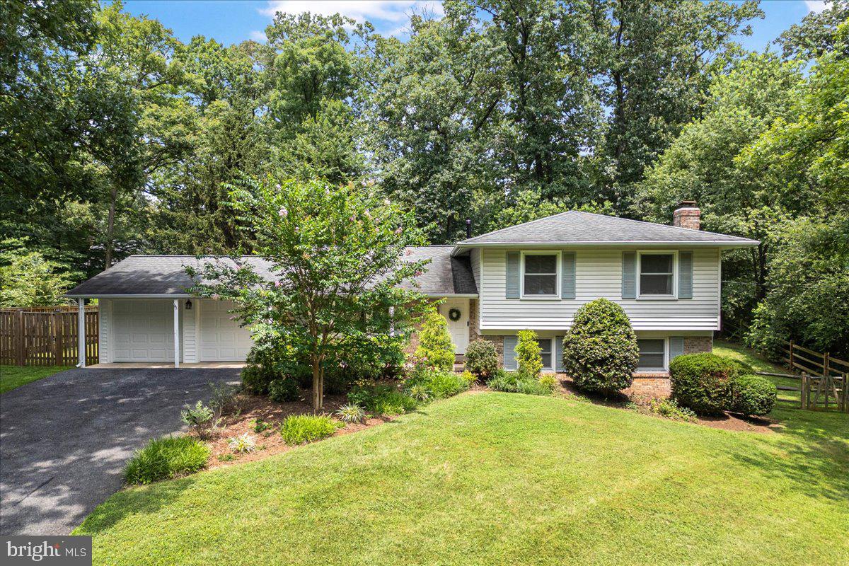 Beautifully updated and impeccably maintained, this 5-bedroom, 3-bath home sits on a one-third-acre, private lot. The light-filled eat‑in kitchen is just right for entertaining friends or small humans while you cook. The direct access from the kitchen to the heated two-car garage makes Costco trips a breeze. The open living room, dining room, and large patio are ideal for casual summer BBQs or entertaining during the holidays. Upstairs is perfect for those wanting four bedrooms on the same level. The spacious primary suite, featuring an updated en-suite bath and walk-in closet for ample storage, keeps cohabitators happy. The walk-out lower level features a family room for relaxing, a versatile fifth bedroom/office, and an updated full bath that is a great spot for work-from-home or long-stay guests. There is plenty of room in the basement for a wood shop, crafts, or boxes and boxes of storage. Minutes to Laytonia Recreational Park and Redmill Shopping Center, and an easy drive to Shady Grove Metro and major commuter routes.