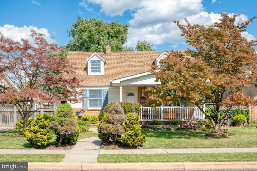 4 BR 2 Ba Cape Cod with a 2 story Detached garage with upstairs living area/Man cave with Heat and Central Air. Two Storage sheds Covered front and back porches, Large Front Yard Landscaped with a Fish Pond and water feature. Hardwood floors and closet organizers.  Move right in!