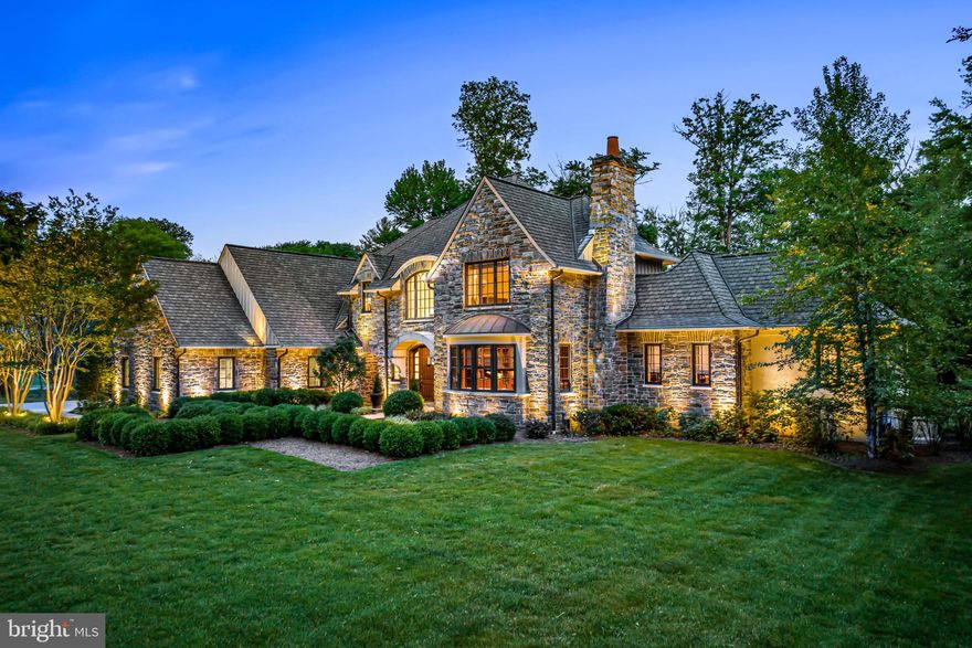 Simply spectacular at every turn! This timelessly designed and meticulously crafted  property offers sophisticated, light-filled, open spaces throughout.  Set on a breathtakingly landscaped, flat acre lot in a quiet, walkable Devon neighborhood, this one-of-a-kind treasure was recently created by a remarkable team of superior craftsman with fabulous materials, thoughtful amenities, state of the art geothermal systems, custom Lutron lighting and remarkable "Four Seasons" level finishes. Endless, understated features include 9'-13' ceilings on the first floor and 9' ceilings on the second level with custom millwork and beams, wide plank flooring and stone accents, windows that offer endless views of the stunning grounds, an incredible gourmet kitchen with fabulous, leathered quartzite island counter and marble with metal tiled backsplash, custom Devon Tile bathrooms, light, bright decor with Venetian plaster walls and an easily expandable floor plan that would offer 5-6 bedroom suites if desired. Walk to shopping, trains, popular restaurants, renowned schools and more. Low taxes and utility costs. This jewel will not last long!