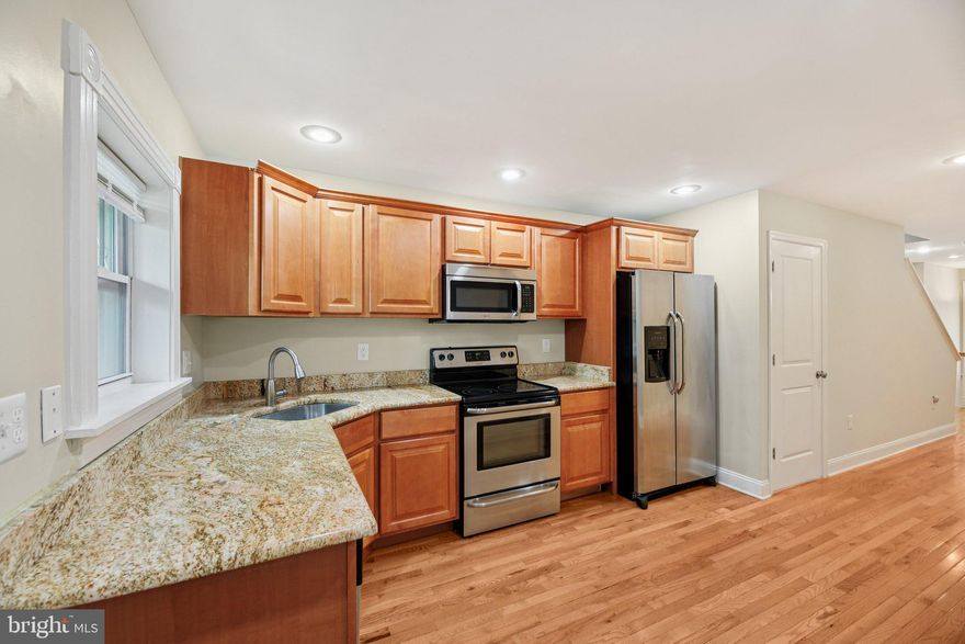 Welcome to 2207 Mullikin St, a beautifully updated 2 bedroom 2.5 bathroom home located in the vibrant and walkable Canton and Hopkins Bayview area of Baltimore. This home blends style, function, and location perfectly. The open-concept main level features hardwood floors, a spacious living room, and a modern kitchen with stainless steel appliances, granite countertops, and ample cabinetry. A convenient half bath is also located on the main level, ideal for guests and entertaining.

Upstairs you’ll find two large bedrooms, each with its own private en suite bathroom, offering flexibility for roommates, guests, or a home office setup. The fully finished basement provides additional living space perfect for a rec room, gym, or media room. Enjoy outdoor living with a private rear patio that is ideal for relaxing or grilling, and the potential for a rooftop deck adds even more value and versatility.

This home is just minutes from Johns Hopkins Bayview, Patterson Park, and the Canton waterfront. With easy access to I-95, I-895, and Eastern Avenue, commuting to downtown Baltimore, Washington DC, or nearby areas is quick and convenient. You're also close to local hot spots including Monument Brewing, The Shops at Canton Crossing, and a variety of restaurants, gyms, and cafes.

Whether you're a first-time buyer, investor, or looking for a move-in ready home in a prime city location, 2207 Mullikin St has everything you need to enjoy the best of Baltimore living.