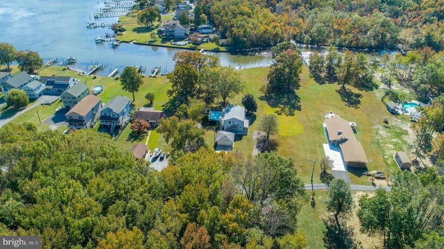 Beautiful Seneca Creek is here for you to build you water front dream home. Great effort has been made to get all the R.C.5 variances approved to build a house across both lots. The lots cannot be subdivided due to code restrictions and a utility easement to benefit lot 231. The site plan includes a 30 by 30 boat storage garage a house that can be 45 feet deep and 50' wide. It also allows a pool in the front yard. It is ready to start the building permit process. There is a house plan available designed for the lot that would be an additional fee. The dock can also be 40 feet off the 106' of waterfront. South Seneca Road is a nice quiet street close to everything but gives you space to have a beautiful house that is not on top of your neighbors. Great place to kayak and swim on a very quiet creek and a quick trip to Hart Miller Island. A copy of the Baltimore County Appeal board order can be sent to any interested parties.