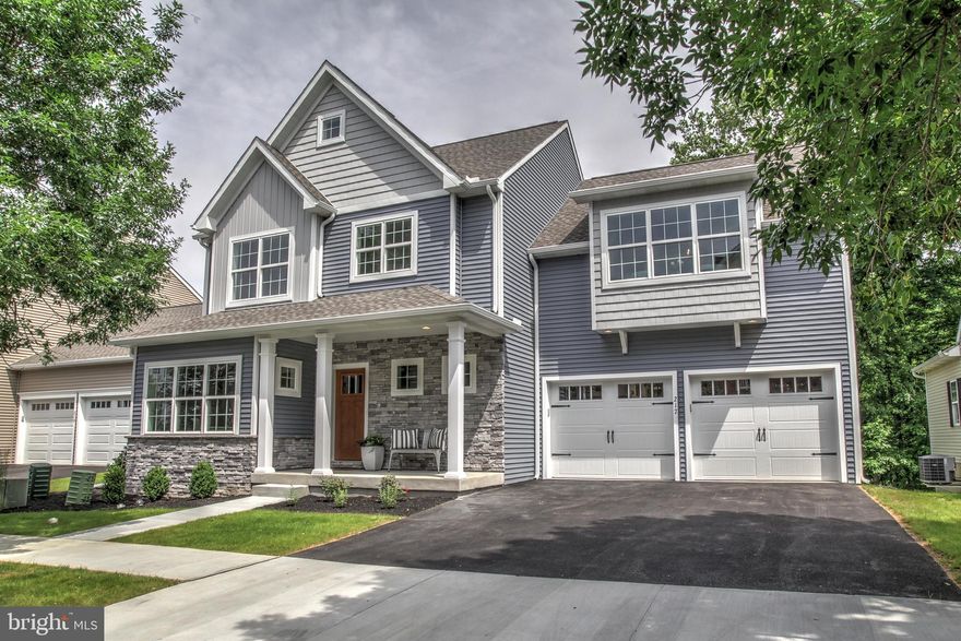 BIA PARADE OF HOMES Awards Best of Show and Honorable Mention for the Fulton Award. This Custom built home by Metzler Home Builders include vinyl plank floors, gas fireplace with stone surround, quartz counter tops, stainless appliances, and farmhouse sink in the kitchen, Master bath includes tile shower and soaking tub. Dining room features a shiplap tray ceiling with lots of windows to enjoy the wooded view behind this home. A trex deck is located just off of the living room.  Included is a Finished basement with Patio and access to walking path, 2-Car Garage and off street parking, Energy efficient gas heat, Nestled in beautifully planned community w/lighted streets, 4 acres of woods, walking path. This home is Minutes from Millersville & downtown Lancaster. Easy access to Rte. 741, 222 and 30