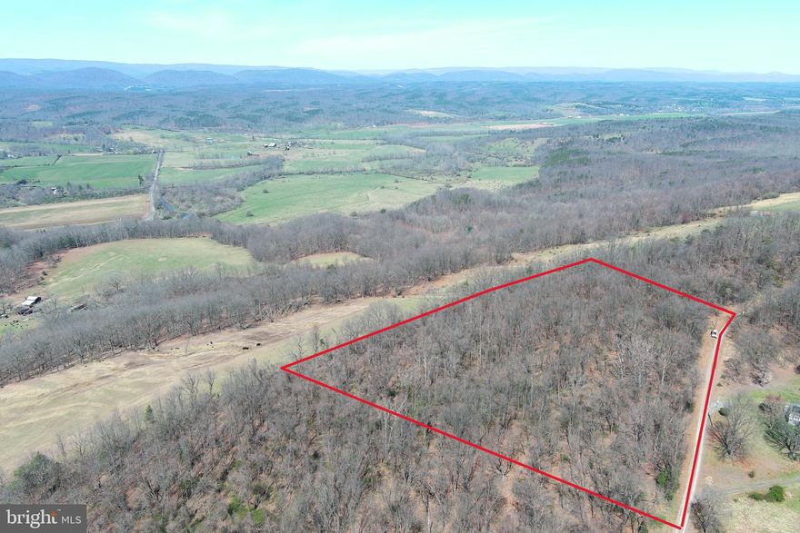 MILLION DOLLAR VIEW FOR UNDER 50K.......NEARLY 6 FLAT WOODED ACRES ELEVATED AT 1200 FT WITH JAW DROPPING LONG RANGE MOUNTAIN VIEWS  TO THE WEST FOR SENSATIONAL SUNSETS. 100% USABLE LAND, PRIVATE, ELECTRIC AT PROPERTY EDGE, ONLY 1/2 MILE OFF THE PAVED ROAD....EASY TO BUILD ON, INFRASTRUCTURE COSTS SHOULD BE VERY REASONABLE. OLDER DEVELOPMENT WITH MINIMAL RESTRICTIONS.....IF THE VIEW IS ALL THAT MATTERS, THERE'S NO NEED TO DROP 150K ON A 20 AC LOT WITH A COMPARABLE VIEW. PANORAMIC PLEASURE AT A PUNY PRICE!