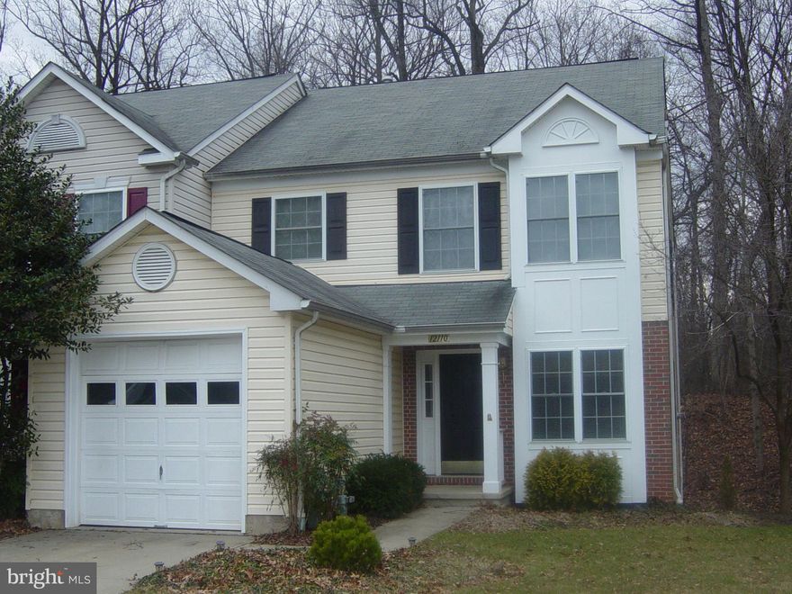 Excellent 4 Bedroom 3.5 Bath End of group townhome in "Towns of Doolan"! Fully finished Basement.4th BR in Bsmt! Wood floors, and carpet and Gas fireplace in Family room off Kitchen with Island. 1 Car garage with driveway, and common parking area. Walk in Closet in Master Bedroom! Move fast, this won't last....