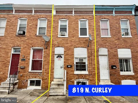 Photo of 819 N Curley Street N, BALTIMORE, MD 21205 (MLS # MDBA2209576)