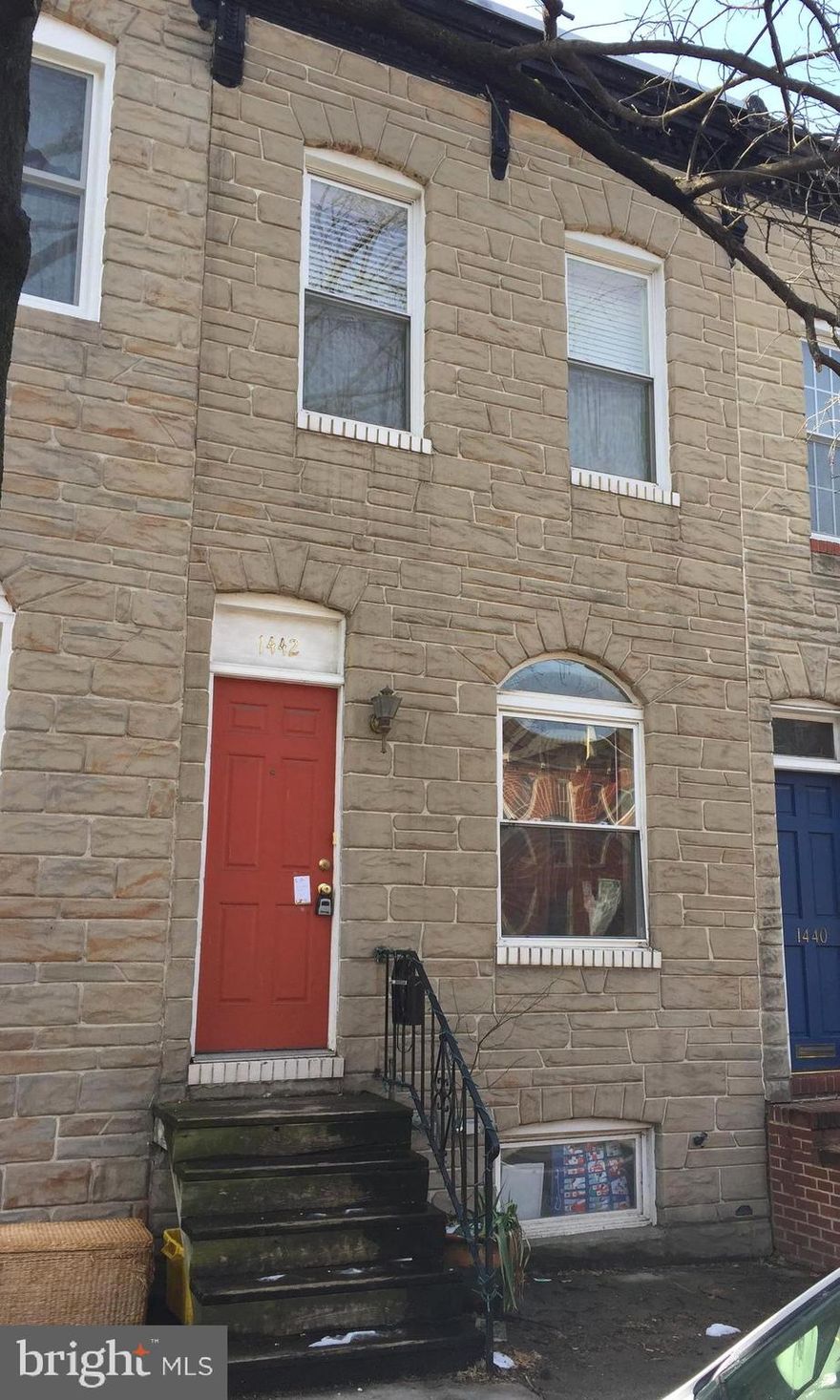 Spacious, renovated home with 2 large bedrooms, 2 full & 1 half baths, original hardwood floors, decorative fireplace, exposed brick, custom staircase, large kitchen looks out to large fenced yard with garden. Ample closets, washer dryer on bedroom level. Roof deck with panoramic water and city views! Centrally located just blocks to groceries, parks, gyms, and 1 mile to Inner Harbor.