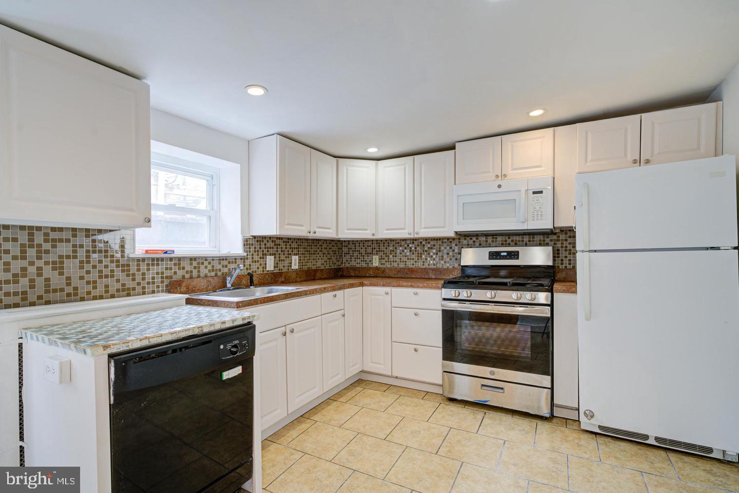 Welcome to this inviting 3-bedroom home nestled in the heart of Old Kensington, where convenience and style come together. Step inside to find a spacious first floor featuring beautiful bamboo flooring, while the rest of the home boasts brand-new carpet throughout. The second floor offers two comfortable bedrooms, a full bathroom, and a versatile flex space room that can be customized to suit your needs. The third floor is home to a cozy third bedroom, perfect for privacy or a home office. Situated just a half block off Girard Avenue and directly across from Acme, you'll love the unbeatable location! Only a 2-minute stroll to the vibrant bars and restaurants on 2nd Street in Northern Liberties, and a 5-minute walk to both the El station and the bustling shops and eateries on Front Street and Frankford Avenue in Fishtown. Don’t miss the chance to live in one of Philly's most desirable neighborhoods, with everything you need just moments away. Schedule your tour today!