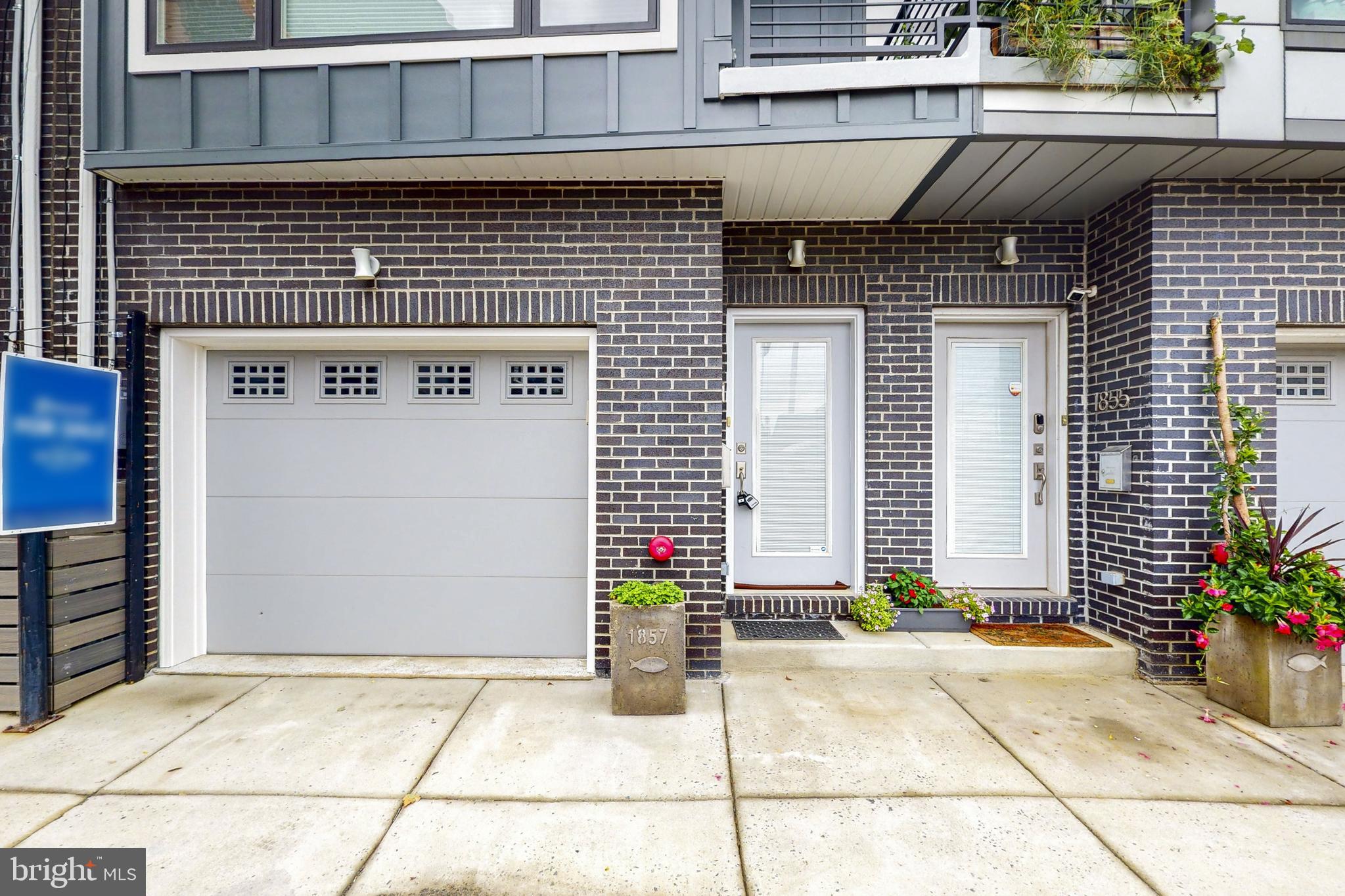 Location, location, location! This 3 bed and 4 bath (2 full and 2 half) home is found in one of the best Philly neighborhoods - Fishtown! With approximately 3 years remaining on tax abatement, this 4 story home is a must-own! Step inside and you’ll gleaming hardwood flooring, recessed lighting, and brand new large windows and sliding doors welcoming natural light on all levels. The entry floor is spacious and has enough room for a formal living that opens up to a nicely sized fenced yard through glass sliding doors. Entertaining guests is made easy with a comfortable half bath. The second level contains the new kitchen filled with Quartz countertops, stainless steel appliances, a range hood, stately tile backsplash, tall cabinetry, and a sizable center island. Glass sliding doors on this area opens up to a balcony overlooking the backyard. The other side is a well-lit family room with ceiling to floor glass windows and a custom-built entertainment center. There is a private balcony that provides a great view of the neighborhood. A convenient half bath finishes off this level. The upper 2 levels showcase 3 substantial bedrooms including the primary bed. The 3rd level contains 2 bedrooms sharing a full hallway bath with shower and tub combo. The laundry closet is found on this level. The top floor is the owner’s haven featuring 3 closets and an ensuite bath with beautiful tile work, a soaking tub, dual sink vanity and glass door shower. You will love the view from your new dedicated balcony overlooking the Daniel Shissler Recreation Center. The fully finished basement is an additional living space that has huge potential for a Recreation/Entertainment area or can be converted to anything you like. Outside this home is a fully-fenced backyard perfect to grow vegetables and flowers. Parking is made easy! You can drive in and enter the house through your attached car garage. The neighborhood is commuter friendly, Berks Subway station is just blocks away! Once you are on the train, you are Downtown in 10 minutes. Living at 1857 Blair St, you will be close to tons of restaurants, bars, breweries, shops, and parks. Look no farther! This house is the perfect home. Schedule your appointment soon!