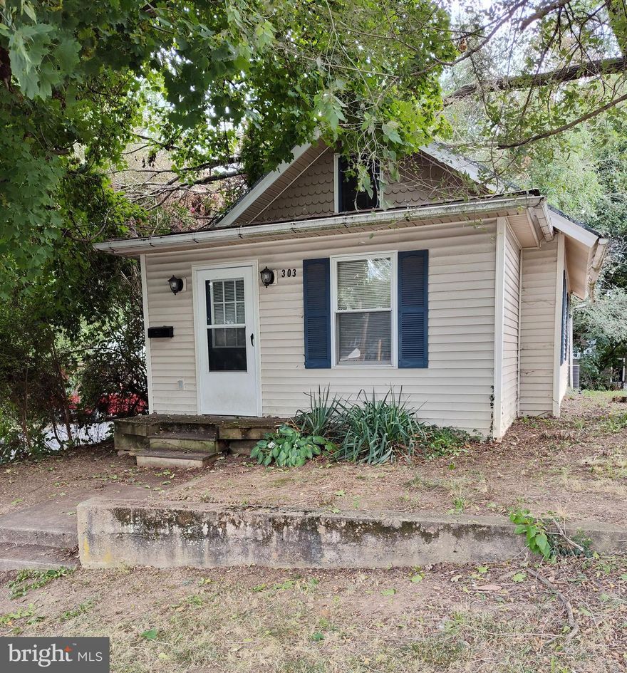 BACK ON THE MARKET--FINANCING FELL THROUGH!  A little tweaking will bring this cute and cozy home back to its classic charm.   The wood floors give a classy look to any decor. This home is  convenient to town,  I- 81 travel,  not far from a four season season resort and mountain trails.  It offers 2 bedrooms, 2 bathrooms, a dining area off of the living room, a finished attic and a main level laundry room. Come see this darling property and decide what tweaks you're going to make.