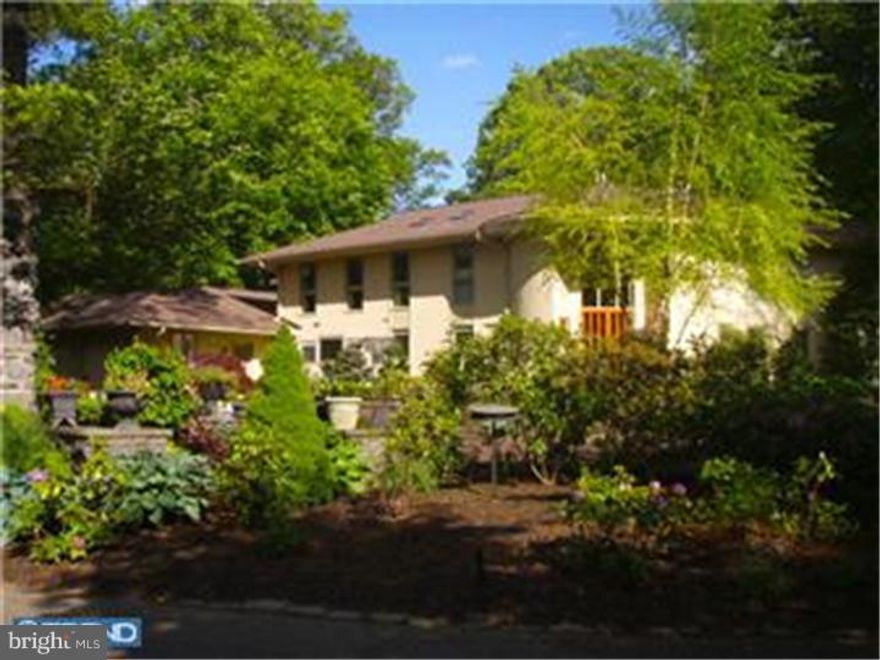 Welcome to this sun-filled California contemporary once featured in Architectural Digest. Located on one of Northside Haverford's most coveted streets, this custom home is built for entertaining. Enter a two-story foyer, with circular staircase into gracious dining and living area, complete with custom marble fireplace, modern kitchen with breakfast nook and family room, also with fireplace.  Oversized windows offer universal views of the large deck, pool and 1.2 acre flat lot with mature plantings.  The second floor offers a beautiful master suite with his and hers bath and walk-in closet, as well as four additional family bedrooms. Finished lower level completes this unique home.