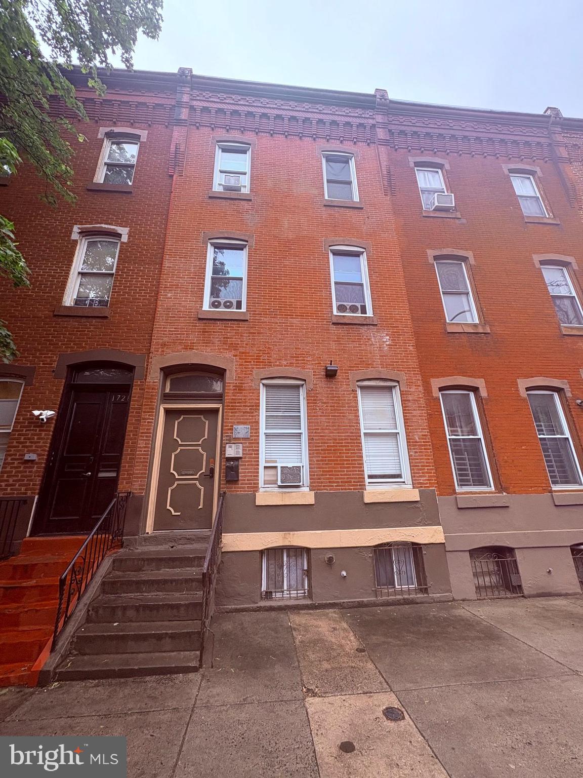PRICE REDUCTION - Calling the savvy investor! Temple University, a fully occupied, exceptional Efficiency/Co-Living Apartment Building, thoughtfully designed to include 9 income-generating units, 8 modern baths, and 7 fully equipped kitchens. The amenities include a hook-up for washers and dryers. This upgraded co-living property is a prime investment opportunity for those seeking robust cash flow and long-term stability. With multiple units producing rental income, this asset outperforms traditional single-family or multi-family investments by maximizing revenue per square foot.
The property’s strategic layout minimizes vacancy risks while optimizing cash flow. Even if one tenant moves out, the remaining units continue to generate income, ensuring consistent returns. Additionally, the flexibility to offer short-term, medium-term, or long-term rentals allows investors to capitalize on shifting market demands, maintaining optimal occupancy rates year-round.
1730 W. Diamond Street is a standout investment purchase due to its significant 2024 upgrades, including modernized kitchens, enhanced bathrooms, and smart home features. With 9 rentable units, the potential income stream can significantly exceed that of a standard 4-unit quad or multi-family property. Plus, while a single vacancy in a quad can reduce income by 25% or more, this co-living building’s structure ensures minimal financial impact from tenant turnover.
Furthermore, the tenant pool for co-living properties is diverse and stable, ranging from working professionals and downsizing seniors to short-term residents seeking flexible, fully equipped living spaces. This broader tenant base not only reduces turnover but also minimizes costly repeat repairs often associated with conventional apartment rentals. This co-living property is not just an investment; it’s a strategic asset designed for sustainable, high-yield returns. Each unit is recently renovated. Cash deal preferred, as-is sale, and POF required before scheduling an appointment to see the property. Agent nor the seller is responsible for incorrect public information, including taxes. Showings are preferred during the Open House due to the tenant’s work schedules. CAP RATE Approximately 7%. Serious inquiries can request the rent roll. MLS does not allow for inputting accurate information regarding the number of kitchens. There are 9 recently renovated units, 8 baths, and 7 kitchens. Read the details of the listing for the set-up of each room. Annual income is approximate and based on current rent roll.