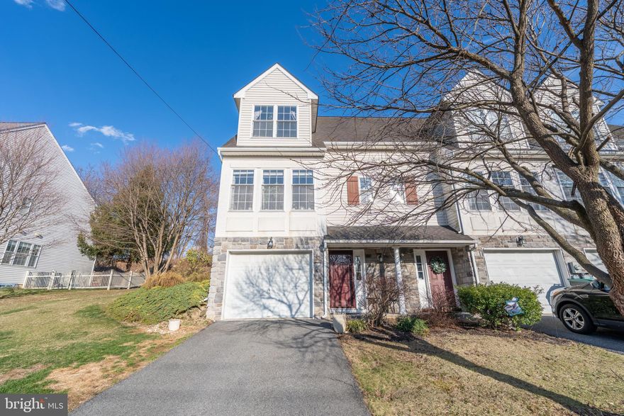 Come experience this beautiful, well-maintained, light-filled end-unit row home in the quaint Carriage Homes of Saucon Creek community! Enjoy the 3-4 bedrooms complete with 2 full baths and 2 half baths. Upon entry, head to the finished lower level where there is a large open family room - perfect for family movie night - with its own wet bar, and also a convenient powder room nearby. On the main level, enjoy this well appointed open concept living floor plan with plenty of natural light, rich-toned hardwood floors, and a beautiful kitchen with granite countertops and modern, sleek black stainless appliances. Walking up to the second floor, enjoy two spacious bedrooms, full bathroom, and convenient laundry area. And rounding out the second floor, savor in the voluminous primary bedroom with large walk-in closet and a well-appointed primary bathroom with dual vanity sinks. And while entertaining with family and friends, be sure to enjoy some relaxing and fun memories together out on the sizable rear deck amid a natural and hearty tree line! Book your showing appointment today!