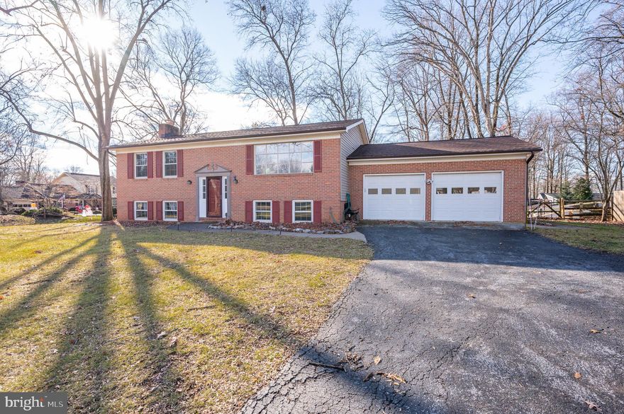 Great home located in sought after Tuscawilla Hills in Beautiful Charles Town, WV!  Easy commuter location just outside Charles Town, Just a quick 30-35 minute drive to Leesburg, VA, Frederick, MD or Winchester, VA and 25 minute drive to Martinsburg, WV.  Just a short 5 minute drive from Charles Town downtown you'll find this amazing Brick front split foyer, 4 bedrooms, 2 upstairs and 2 downstairs, 2 full bathrooms, separate living room, kitchen off dining area, kitchen island, very spacious 2 car garage, fireplace, family room, laundry room, powder room,  principal bedroom with its own full bath, they're all located in the lower level. Large deck with steps to access the large back yard, corner lot. New roof was replaced in 2019, New HVAC in 2020. This home needs some TLC.  Call today to schedule your private showing appointment.
