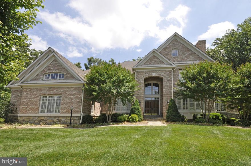 Elegant colonial on 1.3 private acres at the end of a quiet cul-de-sac. Light-filled home with 2-story foyer, formal dining and living rooms, gourmet kitchen w/ island that opens to family room, luxurious master with en suite bath and dual walk-in closets. Walkout lower level with recreation room, wet bar, exercise room, additional bedroom & storage.