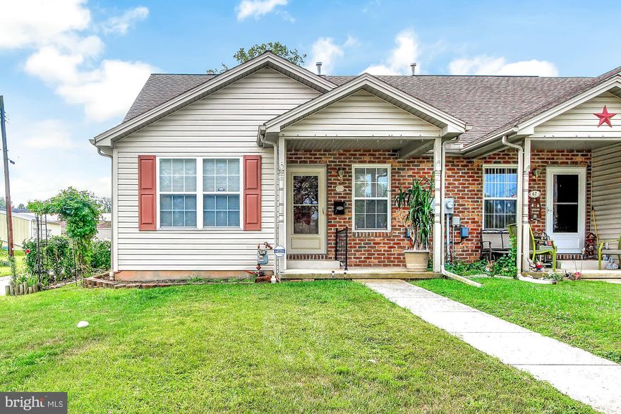Want to be rid of steps? Enjoy one story living here in this two bedroom end unit with attached garage. The combined living / dining area offer entertaining space for your family and friends. Relax outside on either the cozy front porch or backyard patio. Leave those stairs behind and see how this house can become your HOME!