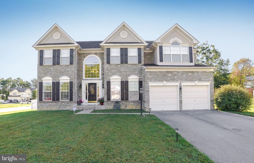 Beautiful 3400 sq. foot colonial w/stone front on a corner lot is ready for you!  This home has 4 bedrooms and 2 1/2 bathrooms.  As you enter the foyer the floor plan opens up to the Living Room and Office/Den w/french doors.  Hardwood floors throughout the main level.  The formal dining room has plenty of space to host celebrations and gatherings.  The gourmet kitchen has granite counters, island w/bar seating, stainless appliances, gas stove top and wall oven, built in microwave and dishwasher.  The sunroom/morning w/vaulted ceilings room creates a cozy and bright setting for early morning coffee with lots of natural light shining through its windows.   The family room off the kitchen  includes a stone fireplace.  The stairs lead you to the upper level and have a stair lift to make accessibility easier if needed.  The primary bedroom has a tray ceiling , includes a sitting area  and an  additional area which could be used for a nursery or office space.  The primary bathroom has a large corner soaking tub, separate shower, and dual vanities.  Three additional bedrooms, a full bath and laundry area finish off the top level of this home.  There is a 2 car garage with garage openers, an alarm system, 6ft vinyl fenced yard and a deck.  Close to the base (down the street from gate 3), schools and shopping.