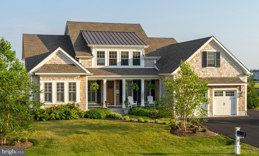 Once you open the solid wood front door and look straight through the Living Rm, 20x20 screen porch to some of the most incredible views of the Wetlands, Canal and Rehoboth Bay, you won't want to leave. This home was designed so you will have some type of view out the back in almost all of the rooms. If you like details, you will love this house. Hardwood Floors throughout the house (except 2nd floor bedrooms, baths & laundry) 225 s.f. 2nd floor deck w/ composite decking off of bonus rm. 10' ceilings and 9' solid wood doors on the 1st floor. 12' Anderson slider in fr. Real cedar shake siding w/ synthetic trim. 48" Wolf Chimney Hood and 48" Range, 30" Sub Zero Wine Chiller, Wolf Drawer Microwave and Sub-Zero Frig. Custom closets in master, Blue stone walkway, front porch, screen porch and patio. See details on Smart House features.