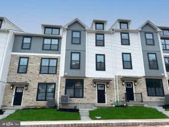 Photo of 129 Cobblestone Drive #JW 4-25, HARLEYSVILLE, PA 19438 (MLS # PAMC2185466)