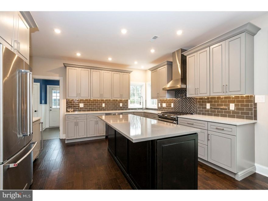 Meet your new dream home: Nestled in the cul-de-sac of a quaint, family-friendly neighborhood, 1239 Great Oak Circle boasts numerous upgrades, modern flair & luxurious amenities. This 1.1-acre lot features meticulous landscaping, private back patio, winding walkway, convenient shed with newly installed roofing, 3-car garage, freshly painted. Breathtaking foyer adorned with marble tile bathes in natural light year-round & opens to grand staircase, elegant sitting room & chic dining room featuring custom tray ceiling, pendant lighting & chair rail. Venture into the two-story great room, replete with cozy gas fireplace & floor-to-ceiling windows, the perfect place to snuggle up w/ family & loved ones during cold winter months. The renovated chef-style kitchen is a foodie's dream, with its sleek & modish design, outfitted with quartz countertops, voluminous storage space, authentic wood cabinetry, custom subway-style backsplash, best-of-the-best stainless steel appliances, pendant lighting, wine rack & wine refrigerator, access to backyard patio, & standalone kitchen island ideal for gathering with family and friends.  Brilliantly-engineered hardwood & LED lighting throughout. First floor also features a private home office, updated powder room & laundry room for convenience. Two grandiose staircases lead you to the second floor, which features 4 spacious bedrooms & a remodeled hall bath with double sinks. The master bedroom is a sumptuous escape, boasting French double doors, lavish sitting room, colossal walk-in closet, romantic fireplace & rejuvenating master bath with soaking tub, glass shower & lush double-sink vanity. The multi-purpose basement is ideal for family time, movie night & cheering on your favorite football team each Sunday, with its custom crown molding & wainscoting, marble gas fireplace & full wet bar complete with refrigerator, dishwasher & cook top are only overshadowed by the granite countertops & Buginga wood bar tops. Basement also features a fitness center & full bathroom features tumbled Italian marble tile & gorgeous vanity. Basement also boasts an extra bedroom for overnight guests.  This home is up-to-date with generator hook-up, smart Nest thermostats on both floors & home wave ventilation features in the basement. Minutes from East Goshen Park & located in a highly-coveted West Chester school district, with convenient access to local shopping and top restaurants, this home is a must-see! Stop by today to make it yours tomorrow!