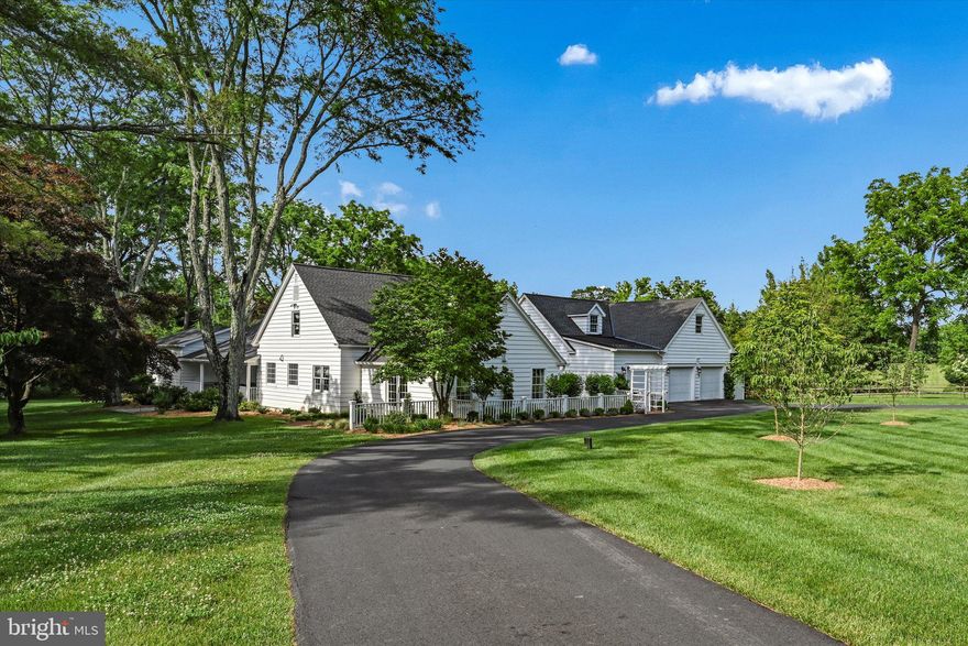 Welcome to, The Dogwoods, this luxurious retreat, exquisitely renovated with the finest details and modern amenities. This stunning home features custom hardwood floors, incredible woodwork and trim, updated doors, windows, drywall and finishes, all add a touch of elegance and warmth to every room. The foyer/greeting room is warm and welcoming for coming home or entertaining experiences leading guests to formal areas or directly to the spectacular English garden. Positive impressions continue through the exquisite dining room and incredible family room with fireplace and doors on opposite walls leading to outside living venues. The spectacular kitchen features marble countertops, Miele and Subzero appliances, 8 drawer island and breakfast nook. The butler pantry doubles as a coffee bar. In the living room enjoy a super size gas fireplace, whole room heatolator and outside entrance to custom brick laid terrace area. The addition includes a spacious first-floor master bedroom suite providing ultimate convenience and comfort, while the additional guest suite ensures privacy and comfort for visitors. Enjoy state-of-the-art heating and cooling systems for year-round comfort and an immaculate 3-car garage that caters to all your storage needs. Located just moments from the renowned Saucon Valley Country Club, championship golf and recreational facilities, this home is the perfect blend of sophistication and luxury. Experience the finest in living at this exceptional residence.