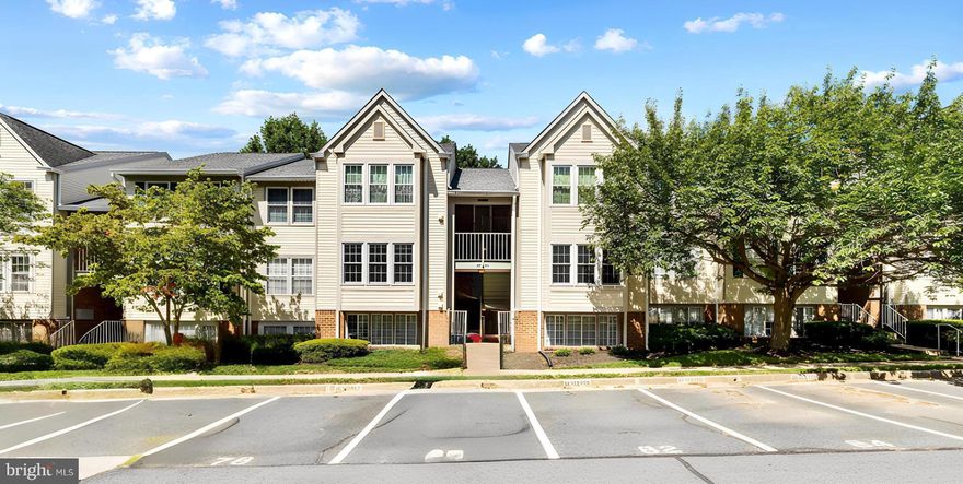 This beautifully updated two-bedroom, two-bath condominium offers the perfect blend of comfort, style, and convenience. This home offers the largest of the three floor plans available in the community. From the moment you step inside, you’re greeted by a warm foyer that opens to an expansive, light-filled living space designed for entertaining and everyday living. The open floor plan is enhanced by fresh neutral paint and luxury vinyl plank flooring, and thoughtful upgrades throughout.

The kitchen features abundant cabinet storage, generous countertop space, and brand-new stainless steel appliances. The adjoining dining and living areas flow seamlessly to a cozy wood-burning fireplace—perfect for crisp fall and winter evenings. Sliding doors lead to a brand-new private balcony overlooking a serene, wooded backdrop, creating your own retreat for morning coffee or unwinding at the end of the day.

The spacious bedrooms include a primary suite with its own full bath, while the second bedroom and hall bath offer flexibility for guests, an office, or additional living space. The in-unit laundry room is equipped with a full-size washer and dryer plus ample storage, making daily tasks a breeze.

Recent upgrades include fresh paint throughout (2025), new deck (2025), luxury vinyl flooring (2020), water heater (2019), and new windows (2021).

Step outside and discover the beauty of nearby Gunpowder trails and the river, perfect for hiking, biking, or simply enjoying the outdoors. Life at Red Fox Farms comes with the ease of a well-cared-for community, offering HOA perks like snow removal, power washing, and annual vent cleanings. 

This inviting condo combines modern updates with a welcoming neighborhood feel—truly a place to call home. Schedule your showing today before this one is gone!