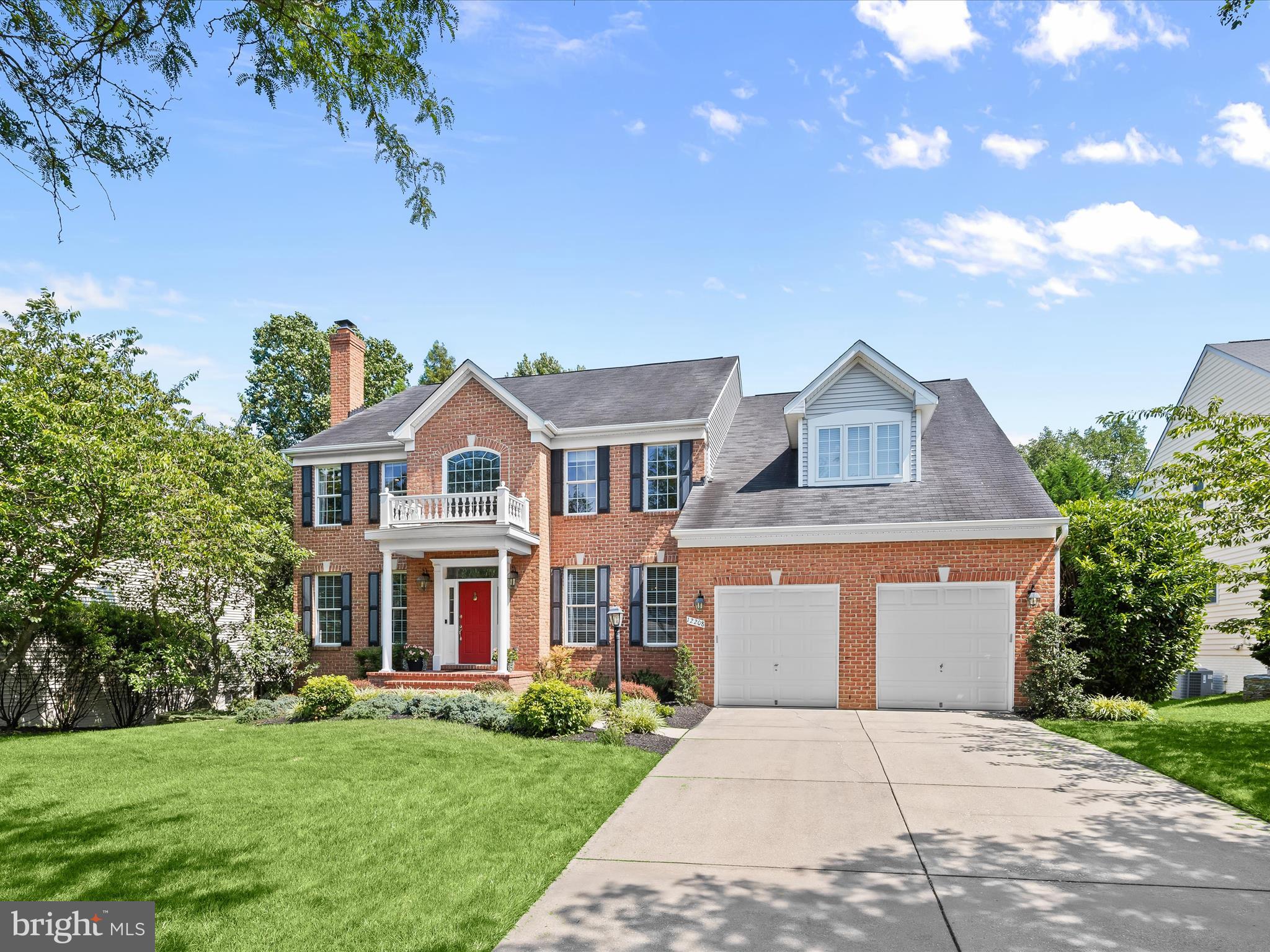 Welcome to 12208 Summer Sky Path, an exquisite, custom-built luxury home by Columbia Builders. Nestled in the prestigious and highly coveted Village of River Hill community in Clarksville, Maryland, and sited on one of the most premier and premium-priced lots ever offered in the neighborhood, this exceptional home backs to protected woodlands with mature trees and scenic community walking and biking trails—offering unmatched privacy and serenity just moments from every convenience. This rare offering blends architectural elegance, luxury upgrades, and refined functionality, delivering one of the largest finished square footages ever constructed in the community. With over 5,700 finished square feet across three thoughtfully designed levels, this five-bedroom, four-and-a-half-bath estate is a showpiece of craftsmanship and design. The stately brick front and manicured landscaping create an impressive sense of arrival. Step inside the soaring two-story foyer and immediately feel the rich warmth of gleaming hardwood floors that carry through French doors to the formal living room with a cozy wood-burning fireplace, an elegant, large dining room detailed with extensive molding, and a private office—perfect for today’s work-from-home lifestyle. At the heart of the home is a chef-inspired kitchen featuring stainless steel appliances, granite countertops, a subway tile backsplash, an architecturally striking angular center island with an integrated sink, pendant lighting, double wall ovens, a new four-burner gas cooktop, dishwasher, and microwave. The kitchen flows effortlessly into the sunroom and spacious family room, which boasts brand-new carpeting, built-in cabinets, and a cozy gas fireplace—ideal for relaxing or entertaining. Step outside from the sunroom to your own private oasis: a wraparound composite deck with built-in seating and dual outdoor speakers, perfectly designed for al fresco dining, entertaining, or simply enjoying the lush views of the wooded preserve beyond. The rear yard offers the ideal blend of nature, seclusion, and functionality. The upper level offers four spacious bedrooms, including a luxurious owner’s suite that serves as a private retreat. Vaulted cathedral ceilings, a separate sitting area, two walk-in closets, and a spa-like bath await—complete with dual vanities, a makeup area, sunken soaking tub, separate shower, and private commode. New carpet graces the upstairs front-right bedroom as well as the rear guest suite with en suite full bath, while gleaming hardwood continues throughout the upper landing. The fully finished walk-out lower level is a true extension of the home’s living space and offers an entertainer’s dream layout. Highlights include a large recreation room with billiards area, a custom-built bar with refrigerator and microwave, a full legal fifth bedroom with closets, a full bathroom, a home theater with large screen and seating, and a cozy den with gas fireplace—ideal for in-laws, au pairs, or long-term guests. This home is equipped with modern updates throughout, including a brand-new electric heat pump (2024) and a high-efficiency gas HVAC Carrier system installed in 2020—providing peace of mind and energy efficiency. Oversized 2-car front-entry garage. Zoned to Blue Ribbon designated River Hill High School/Clarksville Middle/Clarksville Elementary. Extremely convenient location w/in walking distance to River Hill High & Clarksville Elementary Schools, Village Shopping Center, Columbia Association Gym, playgrounds, trails, & restaurants. Major commuter routes include 108, 32, 29, & I-95. This is a rare opportunity to own a signature residence built on one of the finest homesites in the Village of River Hill—combining space, elegance, location, & privacy. Whether hosting large gatherings or enjoying quiet evenings on the deck, this charming home offers a lifestyle of elevated comfort & timeless luxury in one of Howard County’s most prestigious neighborhoods