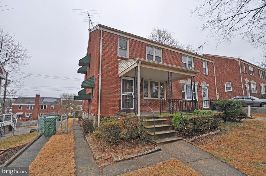 Corporate owned Prop. Sold AS-IS. Semi Detached Townhome features 3 Bedrooms and 1 Full Bathroom. Traditional floor plan on Main Level. Kitchen with an access to a back yard. Hardwood floors throughout. Partially finished lower level with a Family/Recreation Room. Existing toilet can be converted to a half bathroom. Central AC system. Off street parking. Quiet and convenient location.