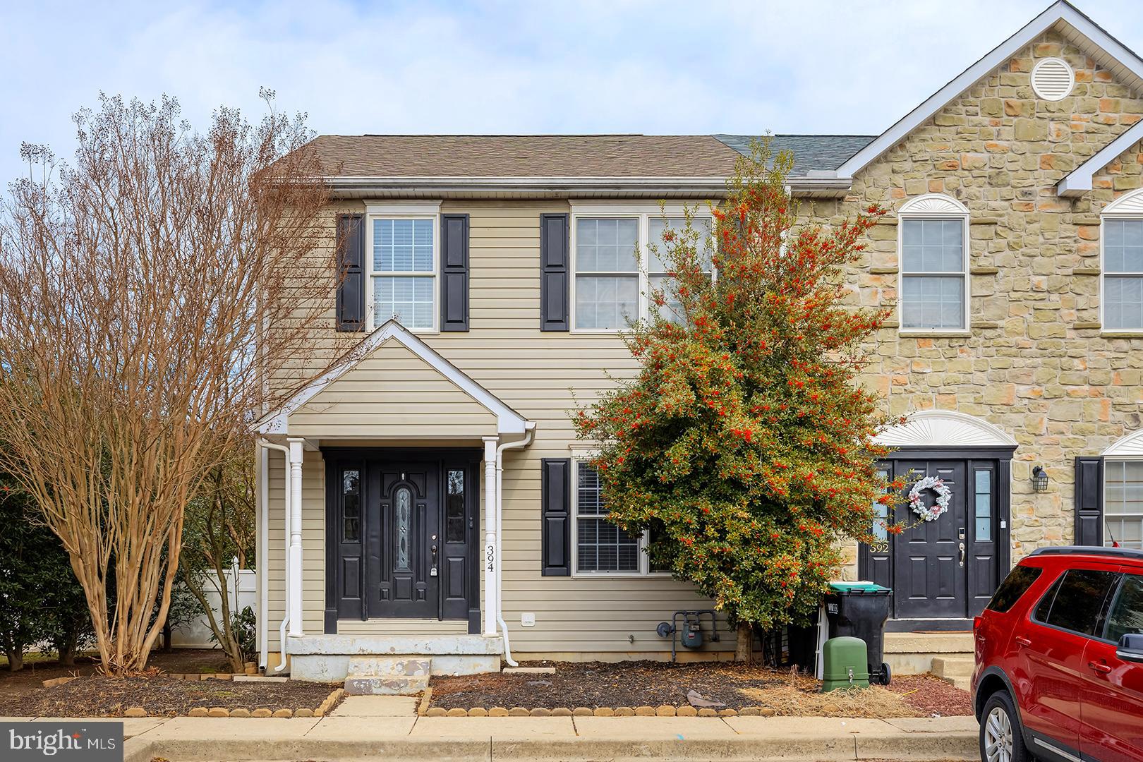 Welcome to this beautifully updated end unit townhome located in the desirable Eagles Chase community. Nestled on a spacious lot, this home boasts a large fenced yard with a deck, hardscaped patio, and a cozy firepit – perfect for outdoor entertaining or relaxation. Step inside to an open floor plan with LVP flooring throughout, creating a seamless flow from the light-filled great room to the kitchen and dining area. The kitchen is equipped with almost new Samsung stainless steel appliances, ideal for preparing meals. Enjoy easy access to the deck and backyard from the main living area. Upstairs, the primary suite features an ensuite bathroom with dual vanities and a step-in shower. Two additional guest bedrooms share a full bathroom, offering comfort and convenience for family or visitors. On the main level, you'll find a powder room combined with a laundry area, providing practical living spaces. Located just a short walk from Smyrna schools and local shops, this home offers both a tranquil retreat and unbeatable proximity to everything you need. Don’t miss your chance to own this gem in Eagles Chase!