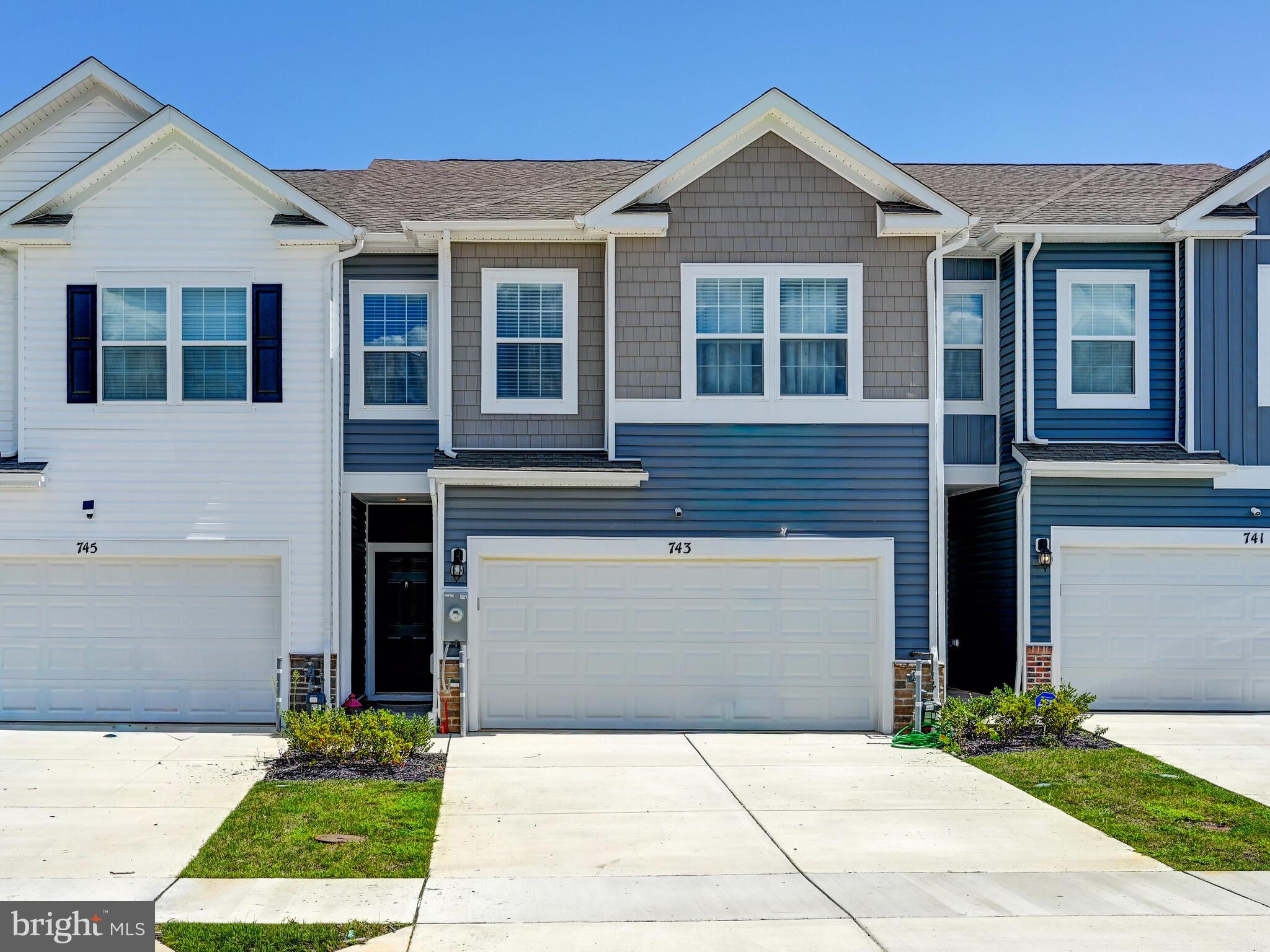 Move-In Ready, lightly lived in and essentially still brand new. Avoid all the extra fee's when buying new construction from the builder and enjoy a few extra custom bonus features already in place. Great location in the community with the open space and playground just outside your front door. Welcome to 743 Pickerel Place! This nearly brand-new villa-style townhome in Ridgely’s Reserve, Harford County’s premier community for single-family and villa homes. Built just one year ago, this Andrews model by D.R. Horton offers 1,934 square feet of thoughtfully designed living space with four bedrooms, two and a half baths, and a two-car garage. With its 24-foot width and open-concept layout, it truly lives like a single-family home. Step inside from the private walk-up porch into a welcoming foyer that opens to a modern, light-filled great room and dining area. The heart of the home is the gourmet kitchen, complete with a 7-foot granite island, stainless steel appliances, gas cooking, and a walk-in pantry—perfect for both entertaining and everyday living. The two-car garage sits conveniently off the kitchen, making daily tasks like unloading groceries a breeze. Upstairs, a wide stairway leads to a versatile loft, spacious secondary bedrooms with large closets, an upgraded full hall bath, and a laundry room for added convenience. The luxurious primary suite is a true retreat with a king-sized bedroom, oversized walk-in closet, and spa-like bath featuring a double vanity. This home also comes with D.R. Horton’s Smart Home Technology package, custom blinds, LED lighting, all kitchen appliances, ceiling fans, and durable hard-surface LVP flooring throughout the main level—everything you need for a truly move-in ready experience. The current owner has added additional personal touches to include upgraded Kitchen and Primary Bathroom Faucets, Kitchen hardware, Patio Door custom blinds, the 18'x24' paver patio also had the garage floor coated in a durable high gloss finish for easy living and clean up! Nestled high above Harford County, Ridgely’s Reserve offers breathtaking views, tree-lined streets, pocket parks, playgrounds, walking trails, and carefully designed landscaping that create a welcoming neighborhood feel. With its prime location just off I-95 at the Fallston–Joppa exit, commuting is quick and easy to Aberdeen Proving Ground, downtown Bel Air, White Marsh, and both north and south Baltimore. This one-year-old villa is the perfect blend of modern design, convenience, and community living—ready for you to call home today.