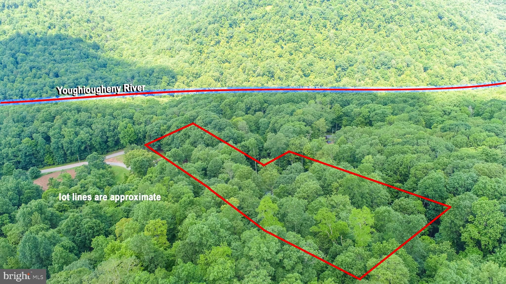 Attention outdoor enthusiasts! This 2.53 acre lot just across the road from state-owned land down to the world-famous Youghiogheny River is a whitewater lover or fisherman's dream. Complete with a gravel driveway up to a flat gravel pad and electric meter ready to go, perfect for a camper or a forever home. Perc-approved for 3 bedrooms and less than half a mile from easy public Yough access. Forested, private, unrestricted spacious lot with a small stream ready for your vision!