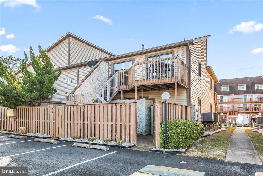 Welcome to your dream retreat at Club Ocean Villas II! This charming 2-bedroom, 2-bathroom unit offers a perfect blend of comfort and style, making it an ideal sanctuary for relaxation and enjoyment. Step inside to discover an inviting open floor plan adorned with luxury vinyl plank flooring, creating a warm ambiance throughout. Enjoy the convenience of modern appliances, including a dishwasher, microwave, and stacked washer/dryer, ensuring your daily tasks are a breeze. Retreat to the spacious primary suite featuring a luxurious soaking tub and a walk-in shower, providing a spa-like experience right at home. The additional bedroom is perfect for guests or a home office, while ceiling fans and window treatments add to the comfort and charm. Outside, the community offers a prime NORTH OC location and a wealth of amenities, including both indoor and outdoor pools, tennis courts, boat parking, racquetball  and well maintained common grounds. Enjoy a quick stroll  (just two blocks) over to the beach or relax on your private patio or deck, surrounded by the serene courtyard views. The corner lot provides added privacy, while secure storage options ensure your belongings are safe. With an association fee that covers maintenance and management, you can spend more time enjoying the lifestyle you deserve. Pet friendly with stations through the community.  A quick two block walk to the beach, shopping, eateries, convenience stores and more! Don’t miss this opportunity to own a piece of paradise—schedule your tour today and experience the warmth and inviting atmosphere of Club Ocean Villas II!