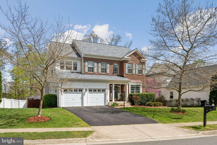 Welcome to this exquisite colonial-style home with a classic brick exterior, nestled in the highly desirable Kelley Farm community. This meticulously maintained property combines timeless charm with modern updates, including a new roof (2020) and a new HVAC system (2022).

Offering 4 spacious bedrooms and 3.5 bathrooms, the home features gleaming hardwood floors throughout the main level and a thoughtfully designed layout filled with exceptional details. Step into the grand foyer that immediately sets a tone of elegance and warmth.

The formal living and dining rooms are ideal for entertaining or enjoying quiet, intimate evenings. At the heart of the home, you'll find a stunning gourmet kitchen equipped with high-end black stainless steel appliances and an open-concept design that flows into the family room—perfect for cooking while engaging with guests or family.

Upstairs, retreat to the luxurious primary suite featuring a spacious bedroom, an oversized sitting room perfect for relaxation or reading, and a spa-like en suite bathroom complete with dual vanities and a soaking tub. Three additional generously sized bedrooms share a well-appointed hall bathroom.

The finished walk-up basement expands your living space, offering a versatile bonus room that can be used as an additional bedroom, home theater, gym, or whatever suits your needs. A full bathroom on this level adds convenience and flexibility.

Step outside to enjoy the large, fully fenced, flat backyard—perfect for outdoor gatherings, play, or peaceful afternoons in the sun.

15667 Altomare Trace Way is a rare gem that beautifully blends sophistication, comfort, and functionality. From the elegant foyer to the inviting living spaces and private backyard, this home has been thoughtfully crafted to support your ideal lifestyle. Don’t miss your chance to make this exceptional property your own!