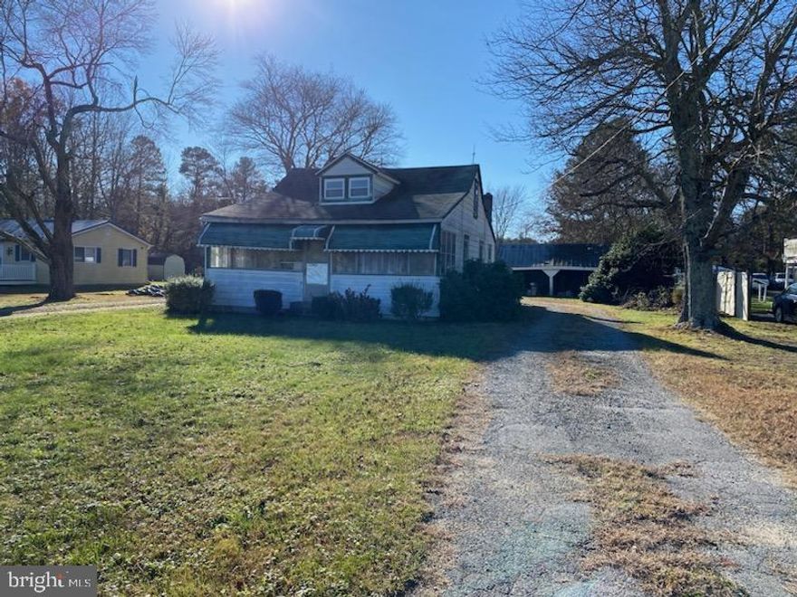 PRICE REDUCED!  This is the sale of an older home that could be remodeled under the FHA program.  Located in the VMX Business District of Loveville near Farmer's Markets and Agricultural/Commercial Products Businesses.  Tremendous upside potential due to zoning!  The land was recently perced and approved.  Property is being sold in strict "AS IS" Condition with no Warranties or Disclosures.  Buyer to pay all closing costs and transfer taxes.  BUYER TO PAY FOR  WELL AND SEPTIC SYSTEMS.