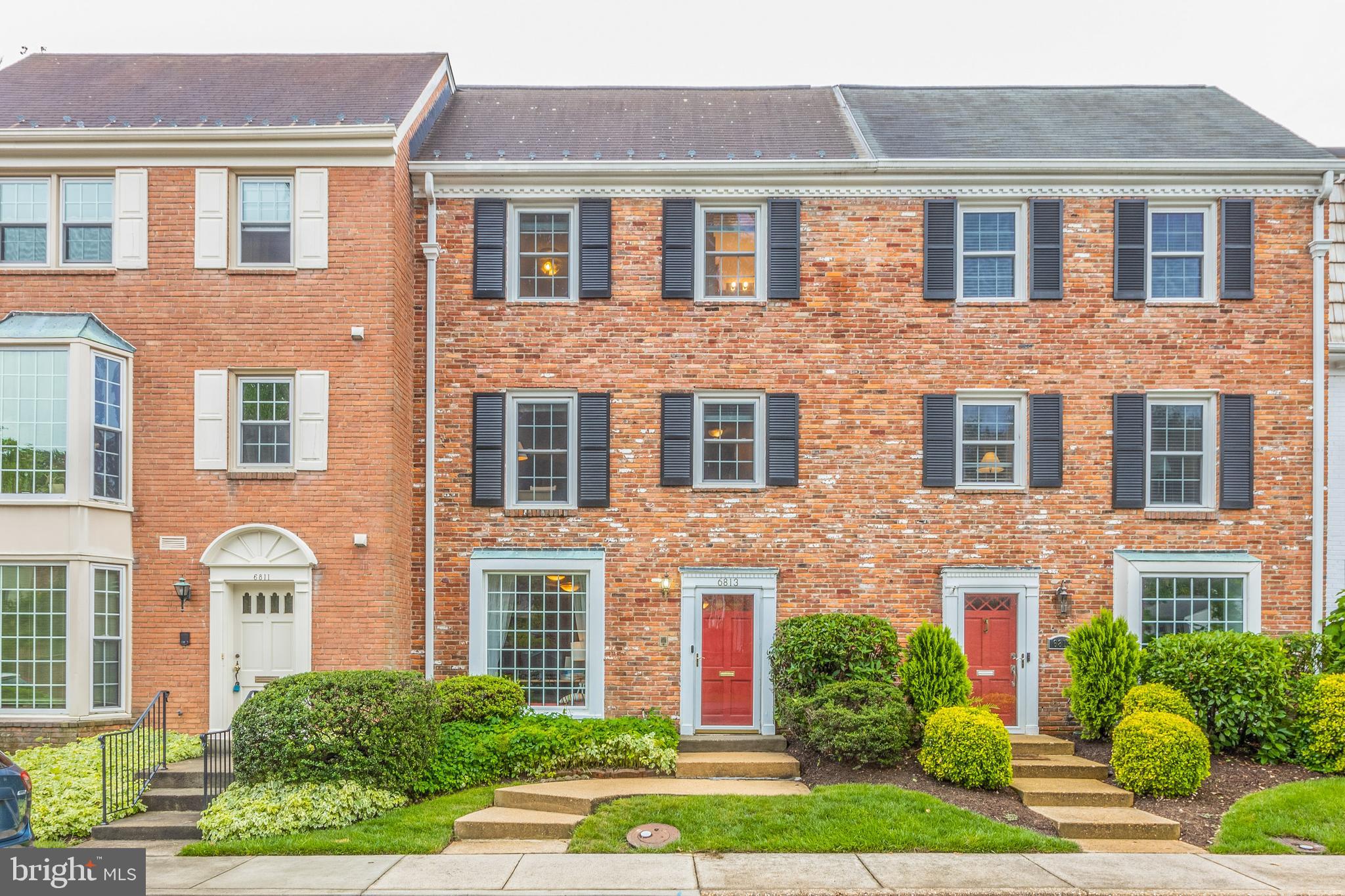 Beautiful McLean Kings Manor Townhome in ideal location. Walk into a spacious tile front entry. Lovely hardwoods on the main and upper levels! The first level features a family room with wet bar and wood-burning fireplace, plus a private in-law/guest suite with a full bath and large storage/laundry room. The 2nd level offers a formal living room with another wood-burning fireplace, separate dining room and kitchen that opens up to a great fenced back yard with a brick patio with plenty of table space and room for grilling. Perfect for entertaining! The upper level has a primary bedroom with ensuite bath, plus two additional bedrooms and a hall bath. The Kings Manor community amenities include a private central community park with basketball courts, jog/ walk path, picnic area, and tot lots/ playgrounds. Excellent location, situated between Georgetown Pike and 123 with easy access to 495 and Tyson's. Highly desired Langley HS Pyramid!