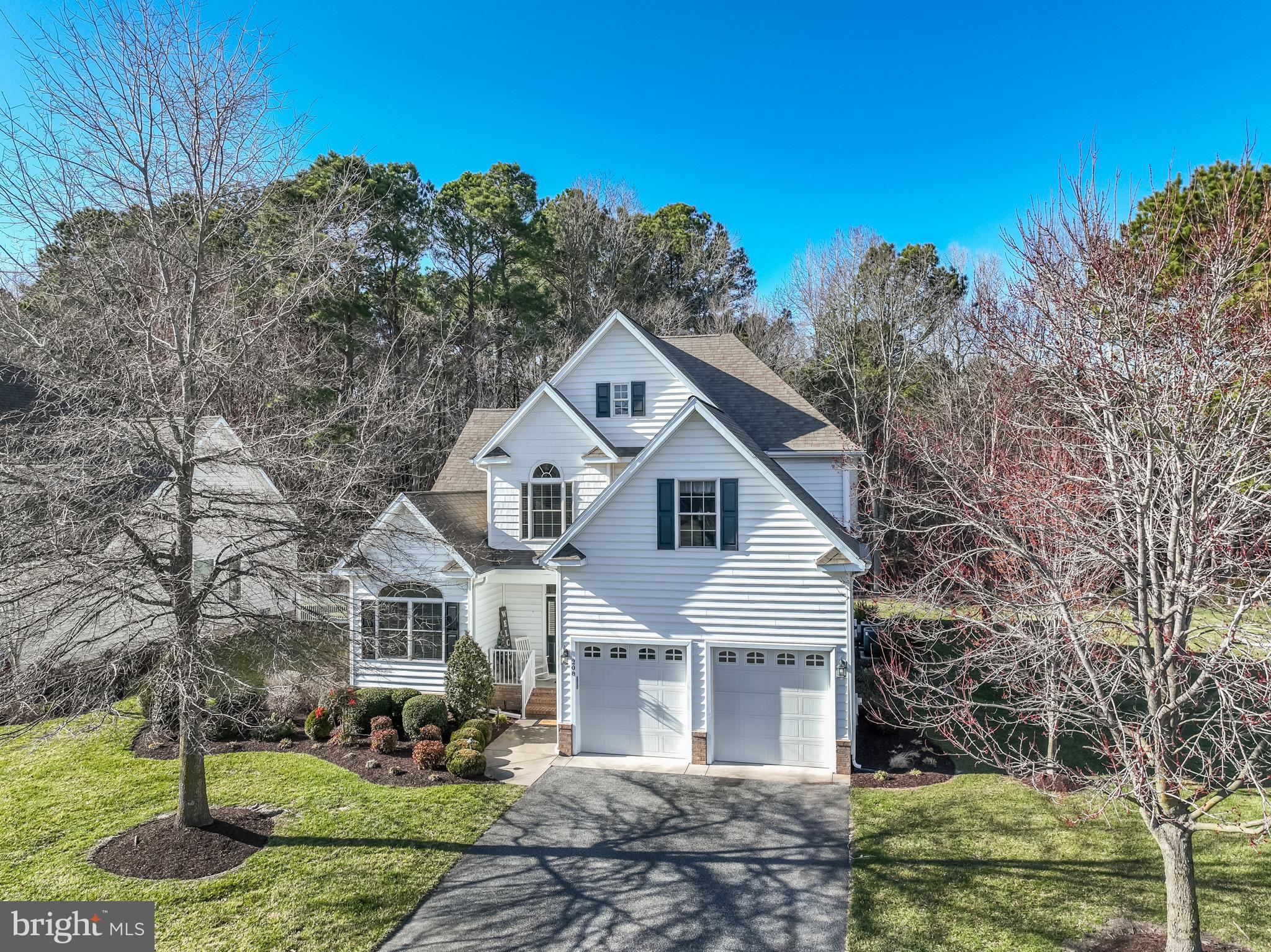 This stunning 5-bedroom, 3-bath custom-built home is located in the highly sought-after gated community of Rowens Mill. The home boasts elegant hardwood floors, soaring vaulted ceilings, a cozy gas fireplace, and a chef's kitchen featuring stainless steel appliances and granite countertops. Adjacent to the kitchen, a sunroom offers tranquil views of the woods and pond, with access to a charming paver patio—perfect for outdoor dining or simply enjoying the scenery. The spacious master suite is conveniently located on the first floor, along with an additional bedroom and bath. Upstairs, you'll find two more generously-sized bedrooms, as well as a versatile fifth bedroom or bonus room that can easily serve as a second family room or game room. A third full bath completes the second floor. Rowens Mill offers a community clubhouse with a refreshing swimming pool, and lawn maintenance is included in the HOA fees for added convenience and peace of mind. As the only gated community in the area, this exceptional home presents a rare opportunity that doesn't come available often. Home comes with a 1 year home warranty. Ask about the top Ten reason to live at Rowen's Mill!