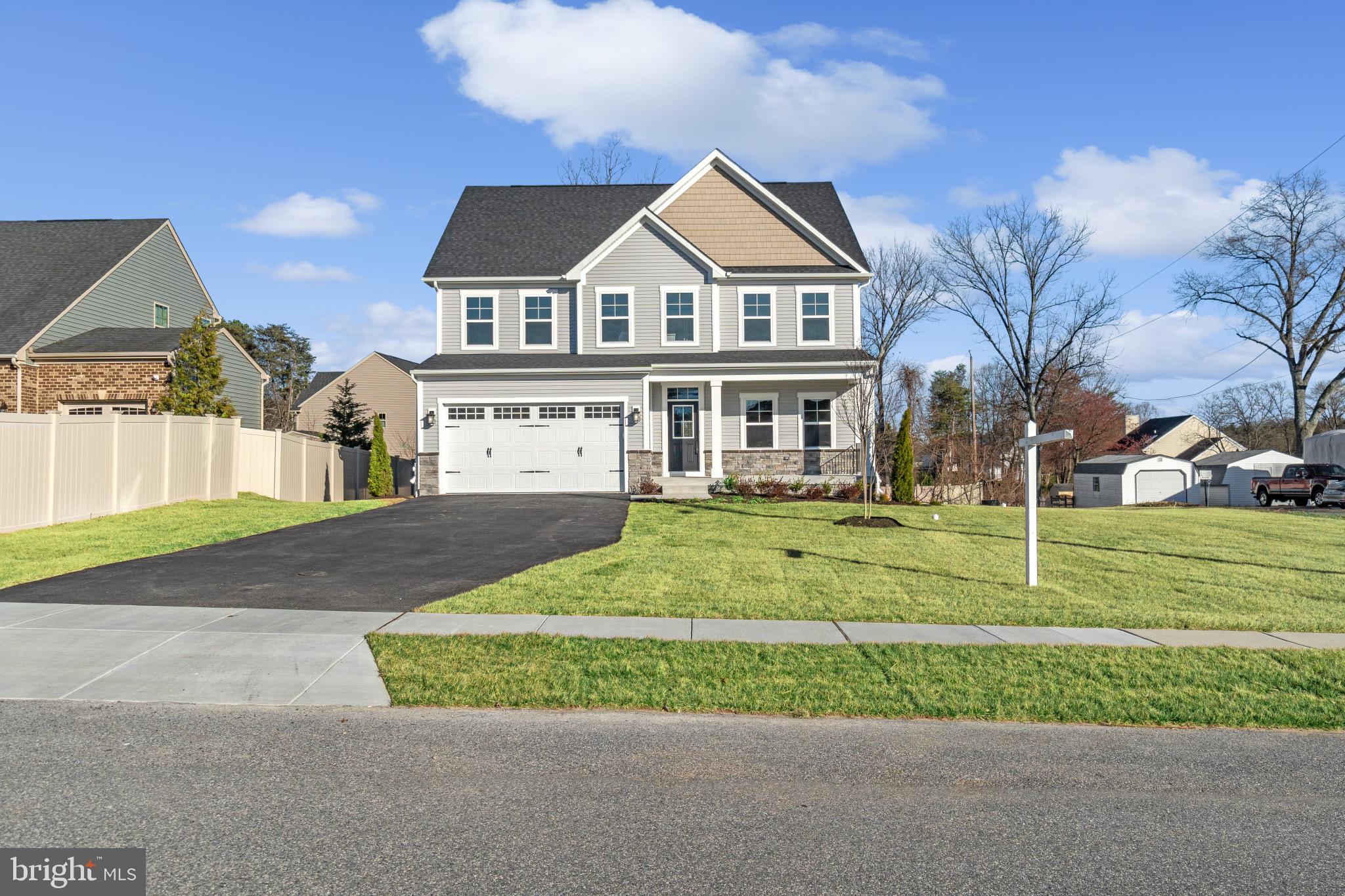 Coming soon! Welcome to your dream home! This stunning brand-new construction single-family home in Severn, MD is the epitome of elegance and comfort, offering an open floor plan with a contemporary design that combines functionality with beauty. Step inside the inviting foyer, where a versatile flex space is perfect for use as a living room, dining room or playroom, depending on your needs. The gourmet kitchen is a chef's delight, featuring a large island, quartz countertops, a farmhouse sink, and a walk-in pantry that connects to the dining and family room. Enjoy the warmth of the fireplace in the family room, as you gather with loved ones. The 2-car garage offers convenient access to the house, with a mudroom and custom arrival center that helps to control clutter, leading to a powder room and a quiet study or office. Upstairs, a loft area provides an ideal space for entertainment, while 4 spacious bedrooms offer ample room for rest and relaxation. The laundry room boasts cabinets and granite countertops, making laundry a breeze, and a double vanity hallway bath provides additional convenience. The luxurious owner's suite is a cozy retreat, with 2 walk-in closets, a large frameless glass shower with custom tile work, and a private bathroom. This home is full of features that make it stand out from the rest, including 9 ft ceilings throughout, crown molding, a chefs kitchen with Timberlake 42" cushion close drawers, oak stairs, 7" LVP flooring, GE stainless steel appliances, tray ceilings, and crown molding in the owner's suite. This is a home you don't want to miss! Schedule your visit today and experience luxury living at its finest!