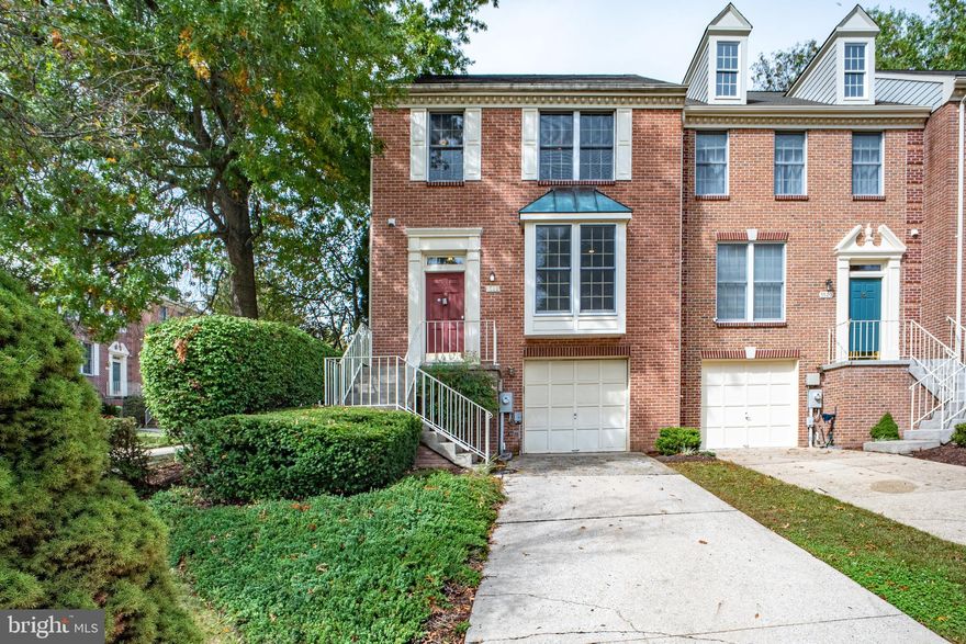 Welcome to this gorgeous brick-front end-unit townhome that perfectly blends sophistication and comfort! This former model home offers 3 spacious bedrooms and 2½ baths, featuring beautiful new vinyl flooring throughout. The main level showcases elegant chair rail and crown moldings, and a bright country kitchen with ample counter space, a planning desk, and direct access to a private rear deck surrounded by mature pine trees—ideal for outdoor relaxation.

The finished lower level includes a cozy family room with a wood-burning fireplace, perfect for gatherings or quiet evenings. The inviting primary suite impresses with vaulted ceilings, skylights, a large walk-in closet, and a luxurious bath with double vanities and a jetted Jacuzzi tub. Additional highlights include fresh paint and an attached garage.

Don’t miss this exceptional opportunity to own a beautifully maintained home in a serene and convenient Columbia neighborhood!
